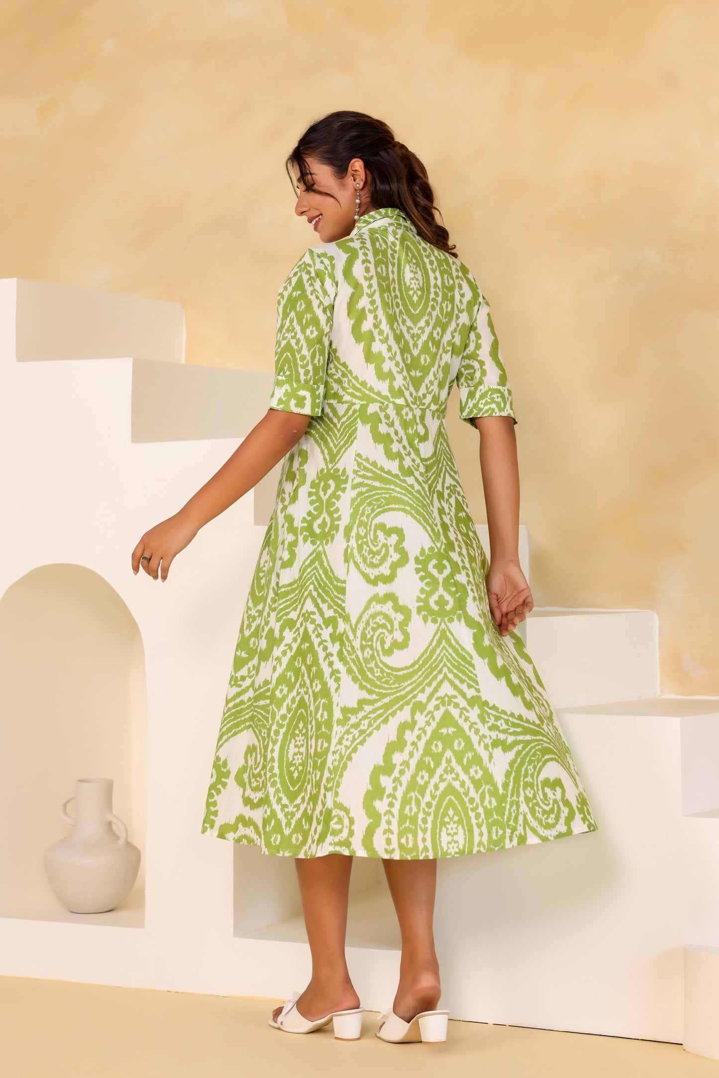 Stylera green boho summer dress with a flowy A-line shape and short sleeves