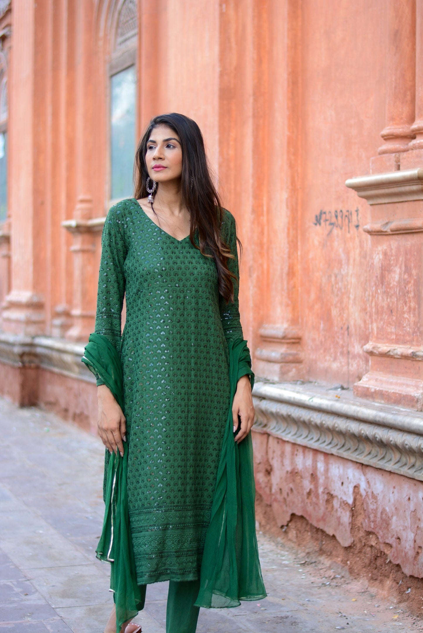 Elegant green three piece suit for women by Stylera featuring detailed embroidery and matching dupatta