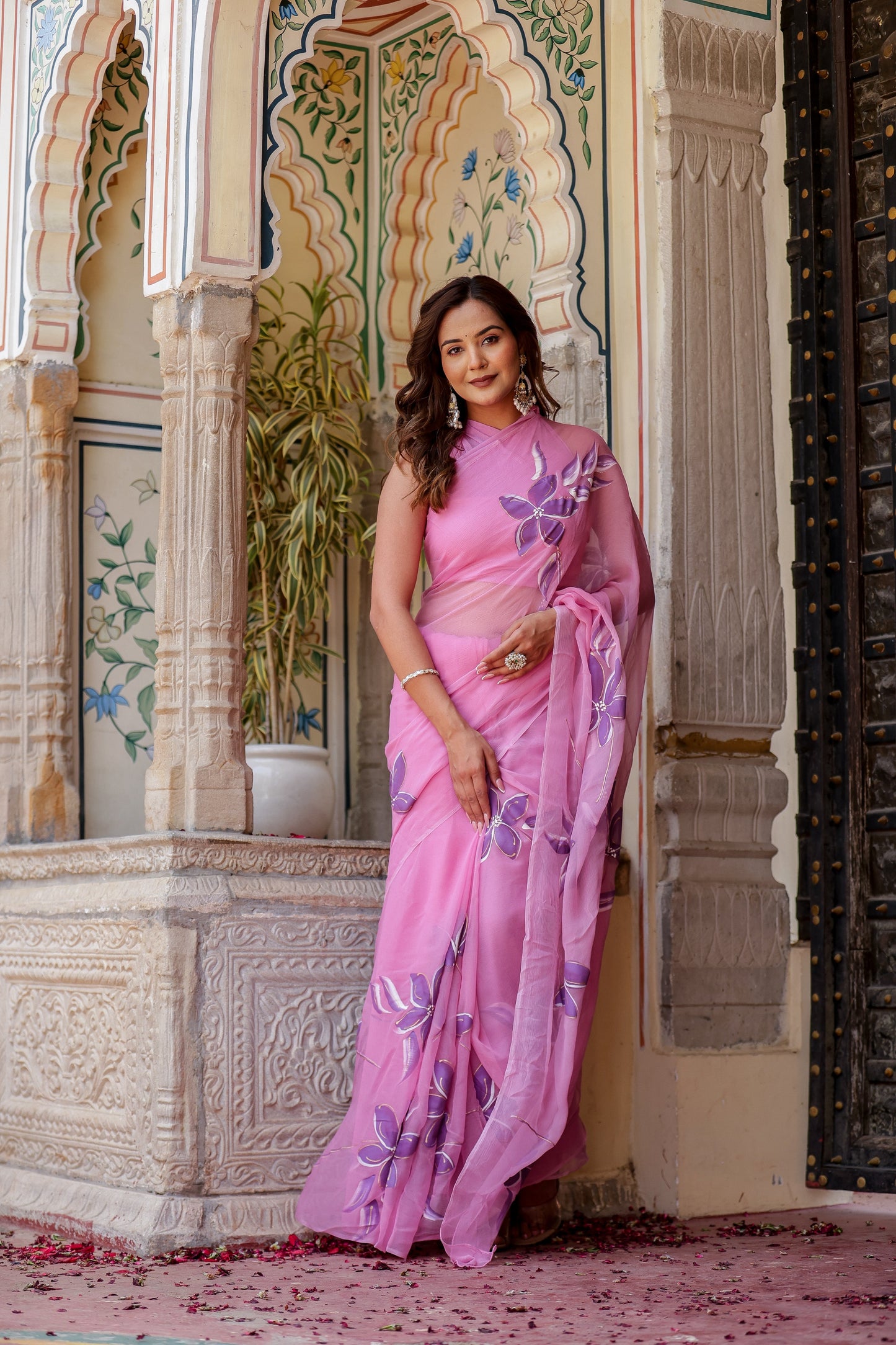Elegant handpainted lavender chiffon saree with floral designs, perfect for special occasions