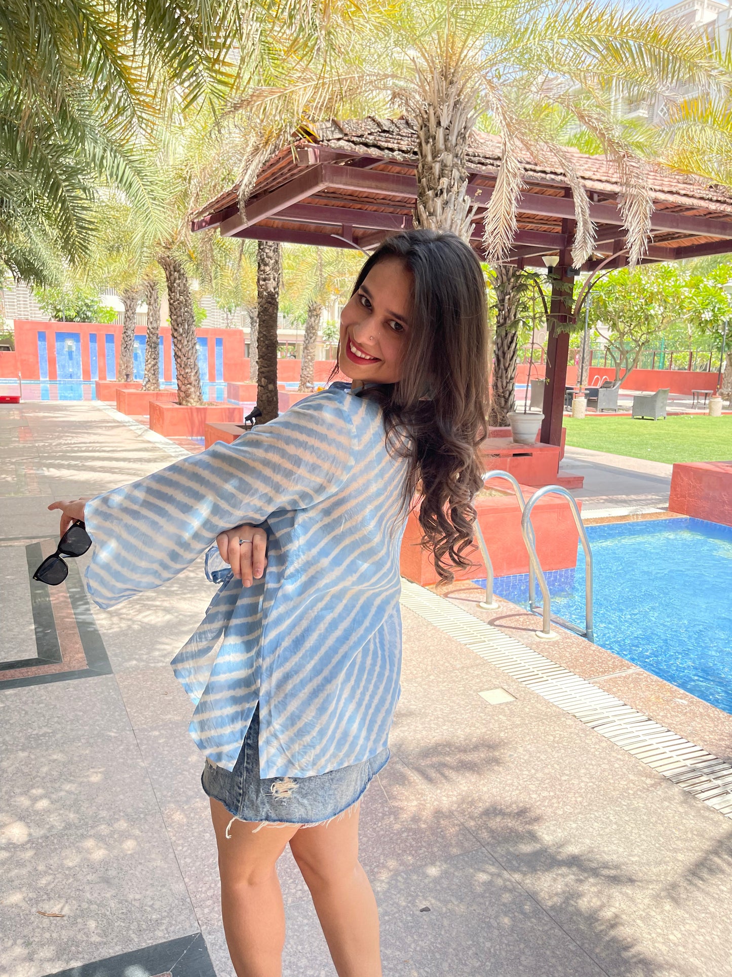 Stylish lehriya print summer tops for women in light blue and white, perfect for casual outings