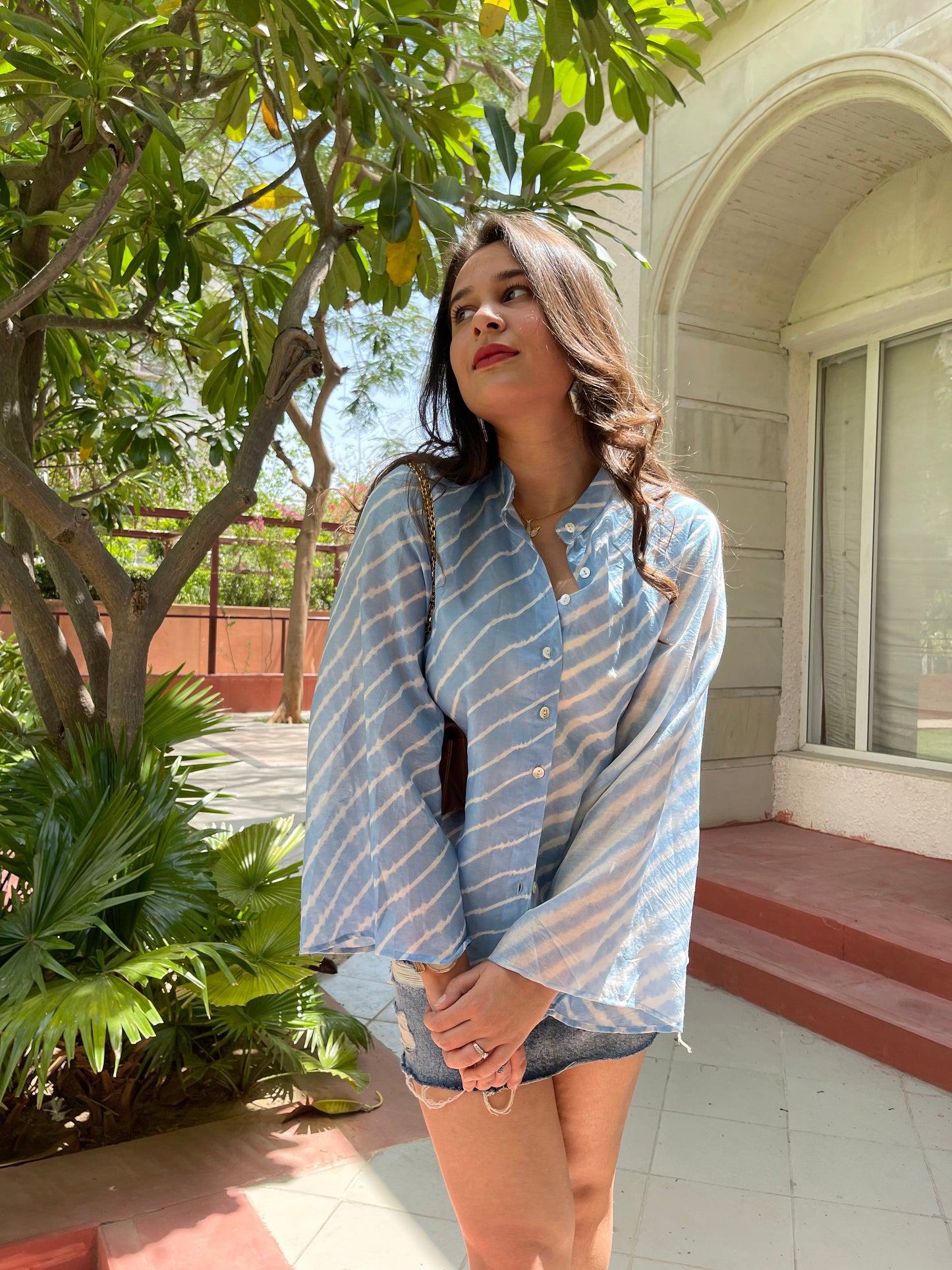 Light blue lehriya print summer tops for women with loose sleeves, perfect for casual outings