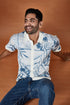 Lightweight beachwear shirt in blue with floral design, perfect for casual summer outings