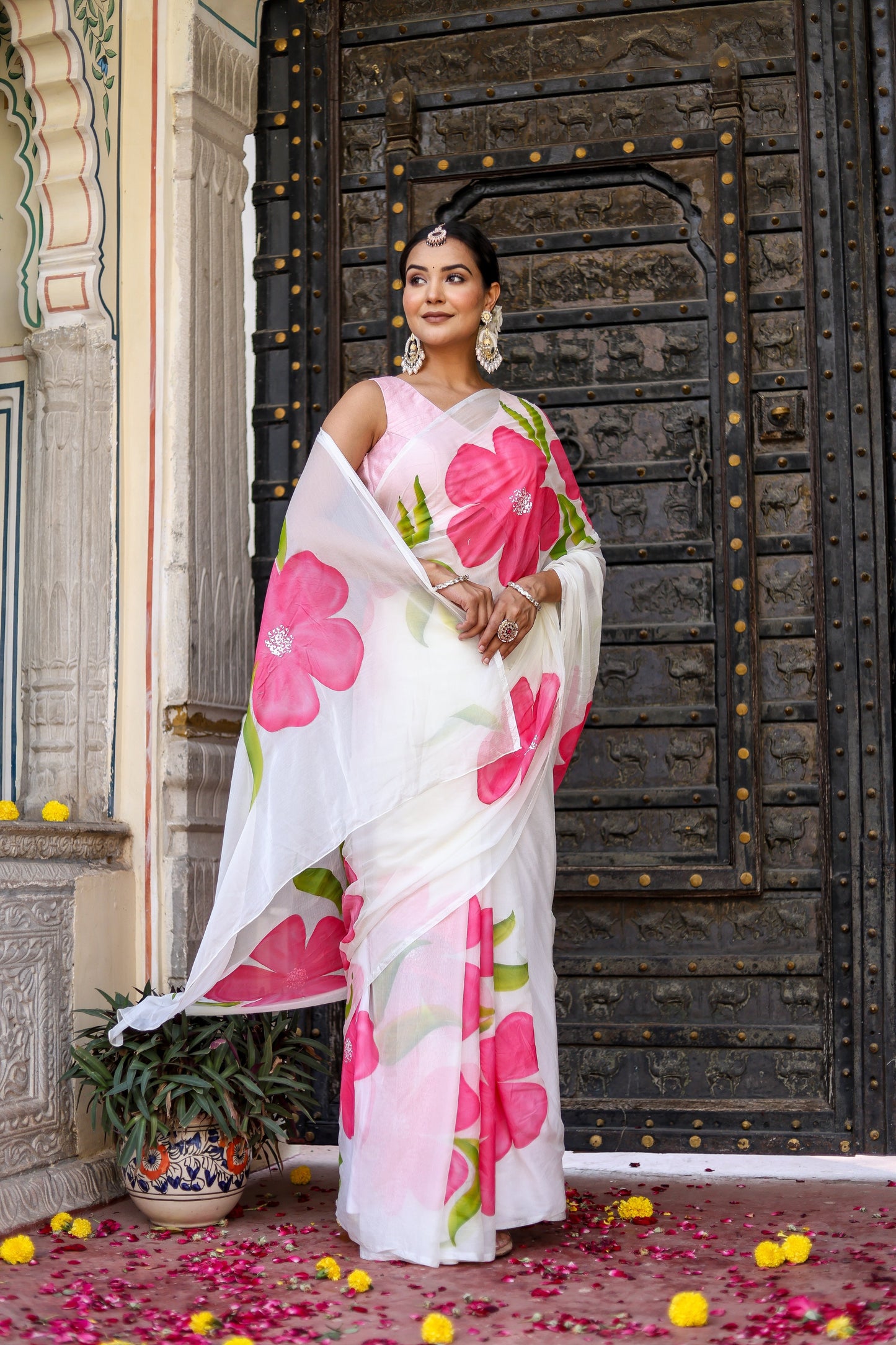 Elegant lightweight party wear chiffon saree with vibrant floral patterns for festive occasions
