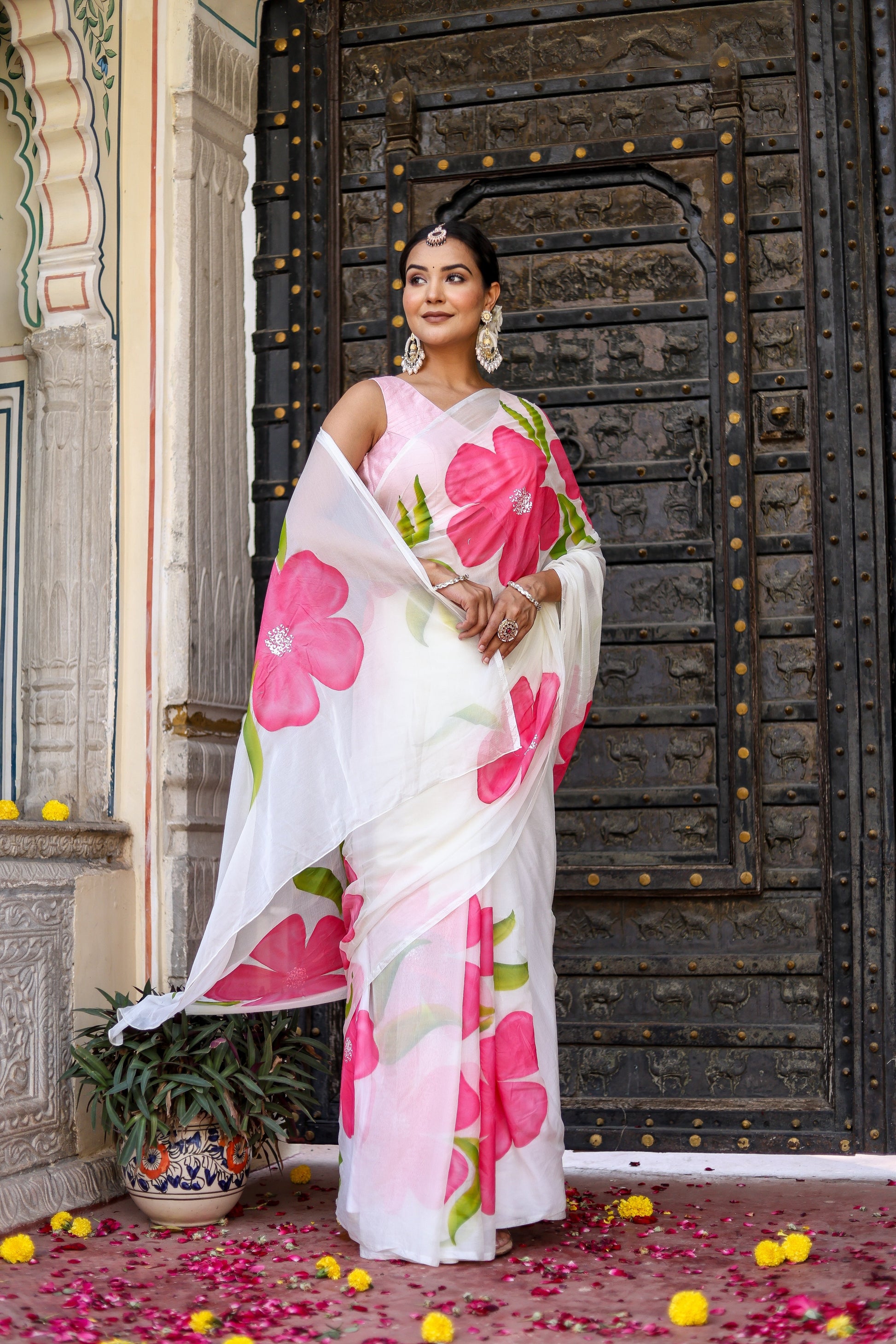 Elegant lightweight party wear chiffon saree with vibrant floral patterns for festive occasions