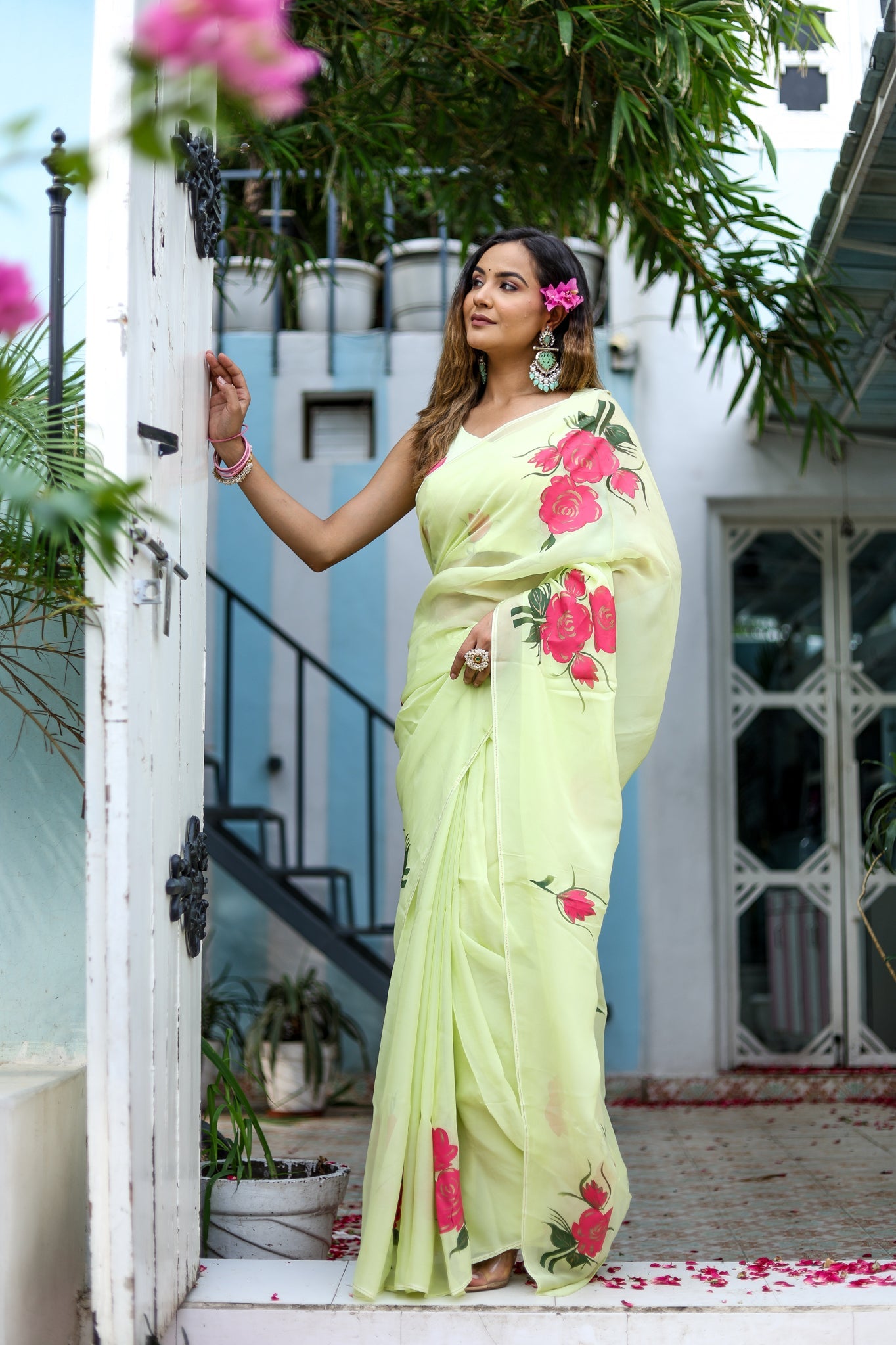 Elegant Stylera lightweight pastel saree with floral print, featuring vibrant roses for a stylish look