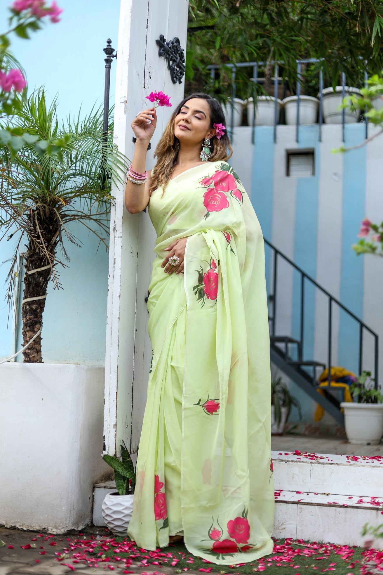 Elegant lightweight pastel saree with floral print designed for festive occasions and stylish gatherings.