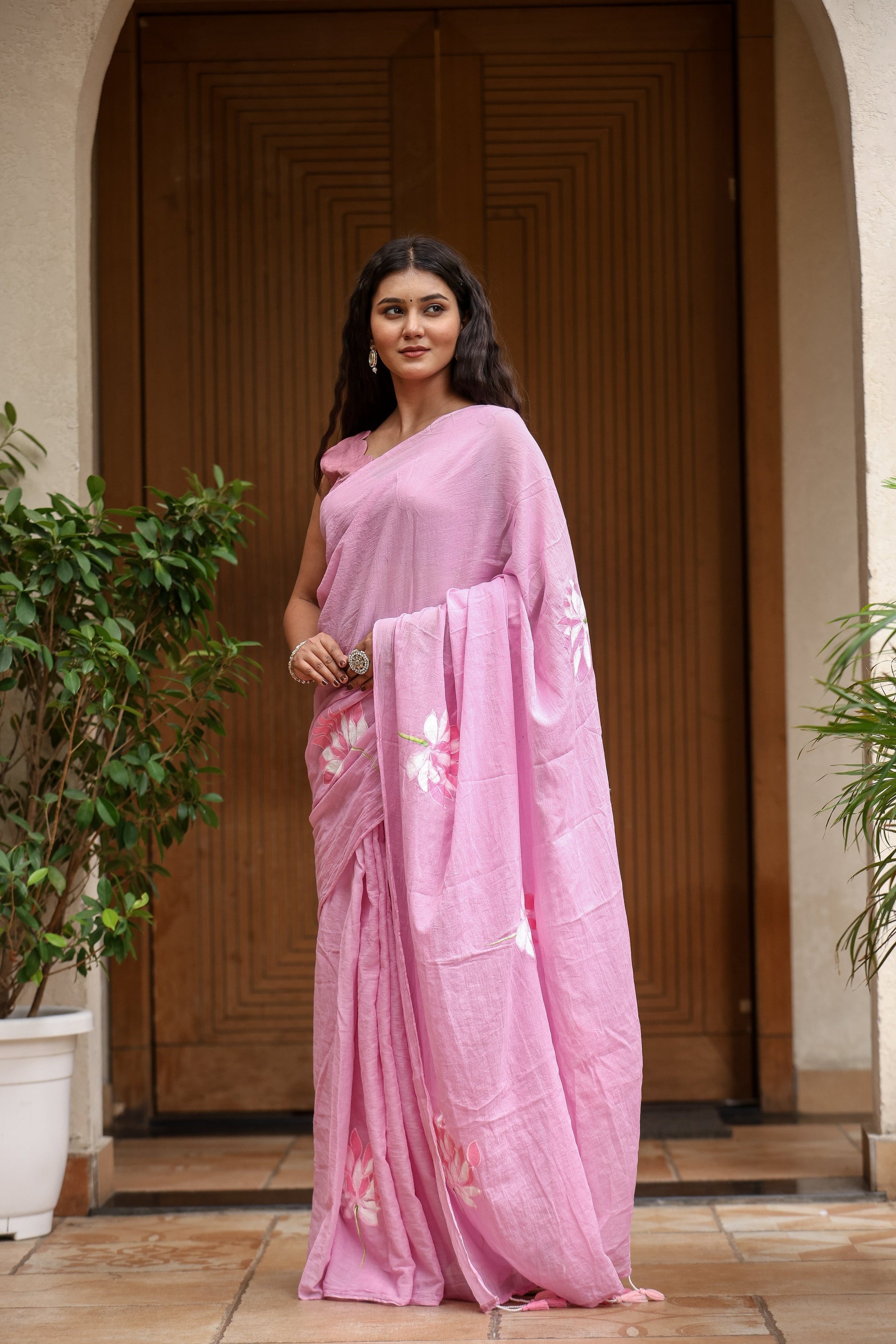 Elegant pink lightweight summer saree for women with floral embroidery, perfect for warm weather occasions