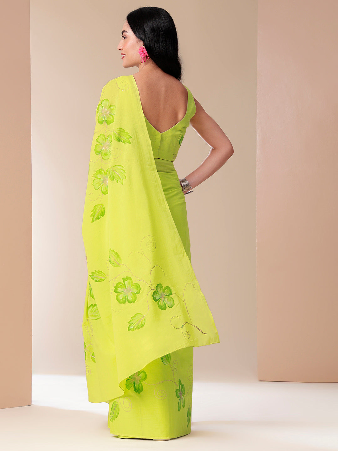 Stylera vibrant green mal mal saree for women with floral designs, perfect for festive occasions
