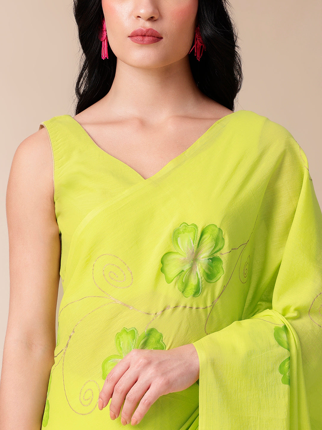 Bright green mal mal saree for women with floral embroidery and elegant drape
