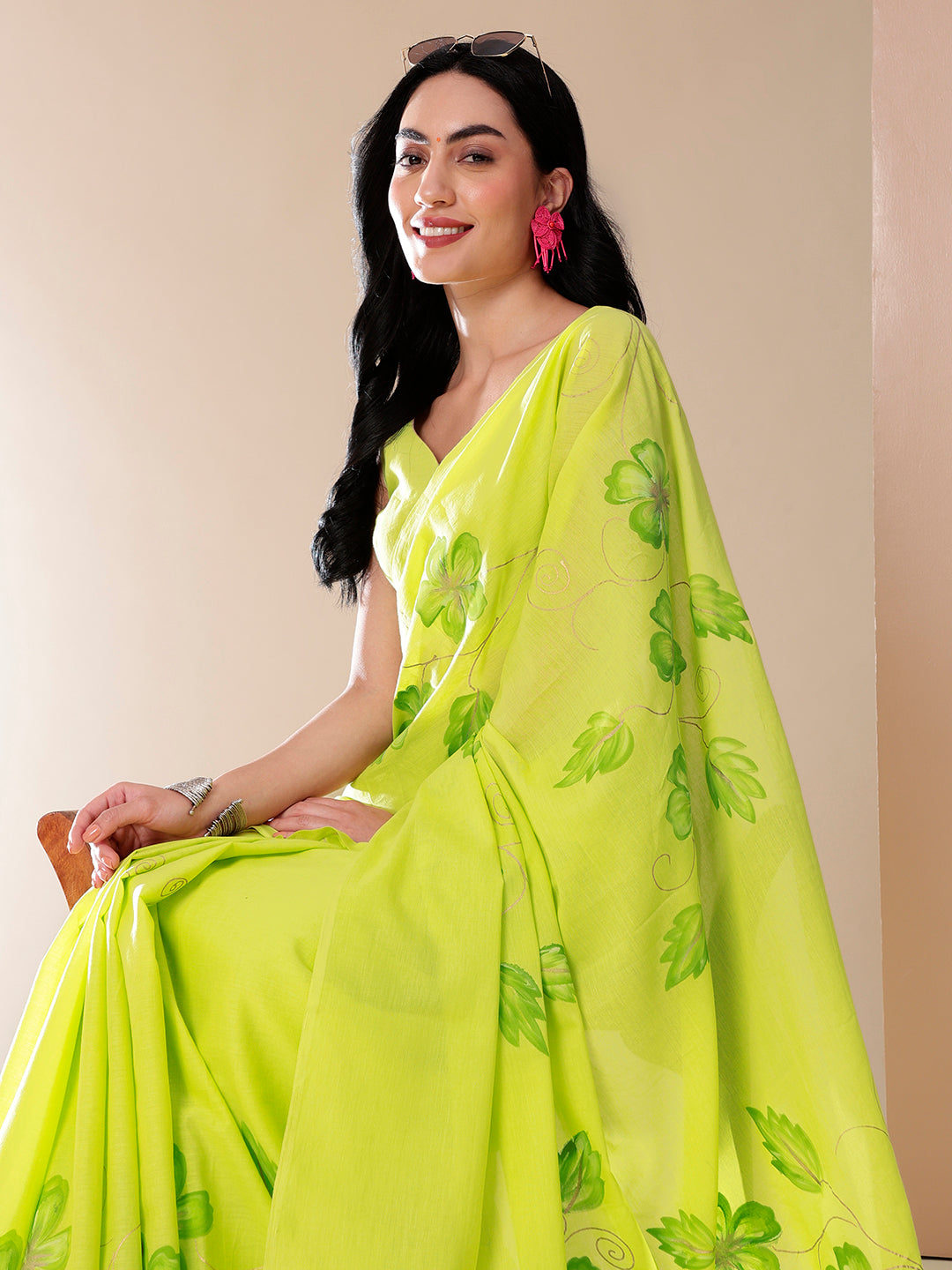 Vibrant Stylera mal mal saree for women in bright green with floral prints, perfect for casual wear