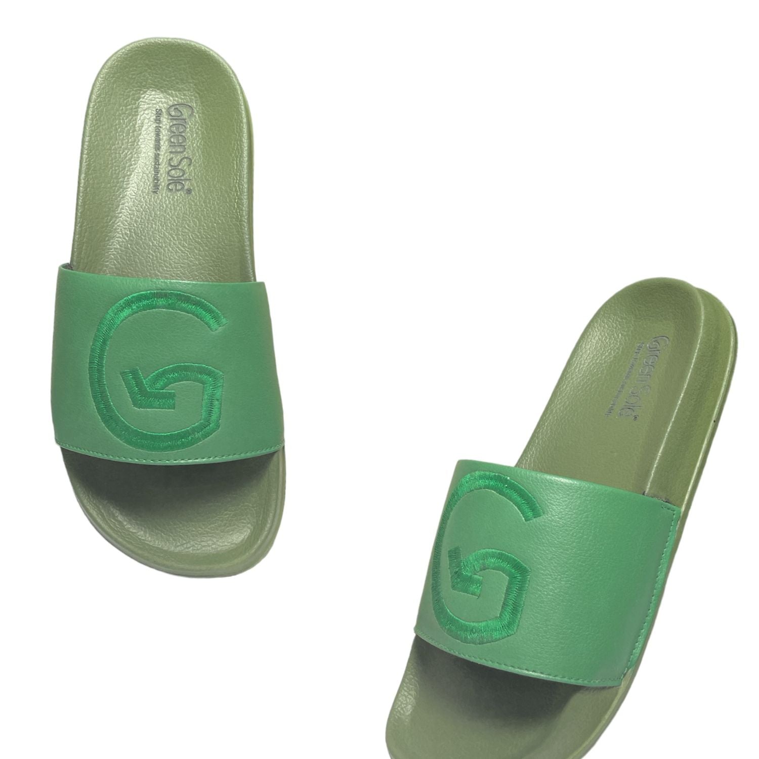 Men's green sliders from Stylera featuring comfortable design and logo detail