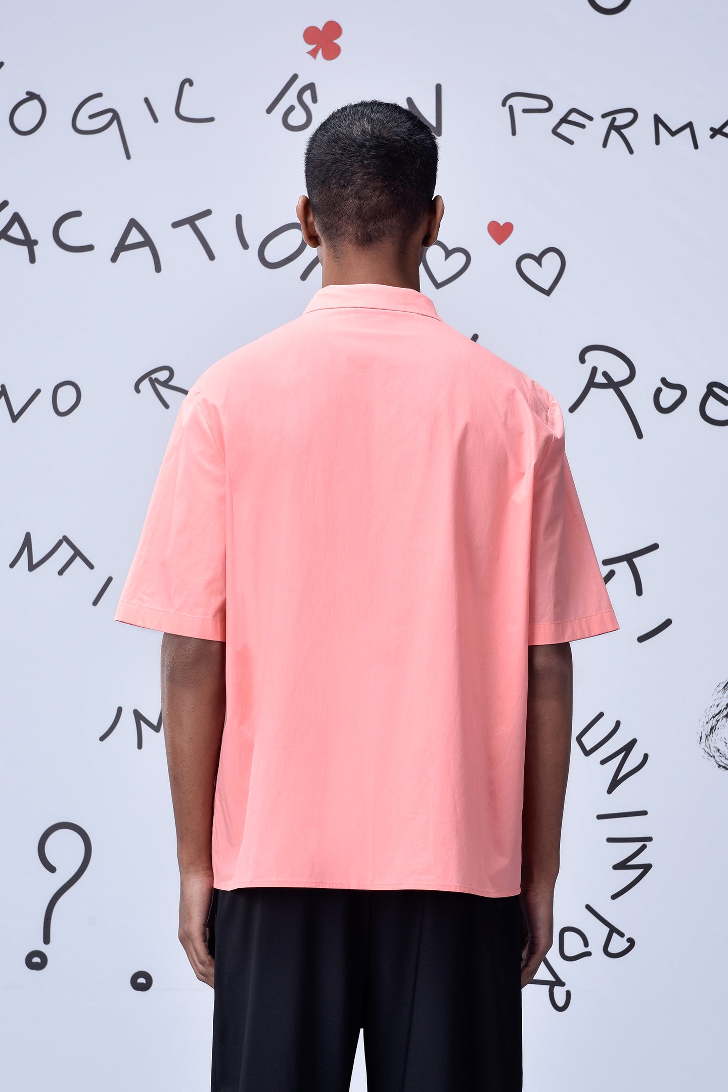 Back view of man wearing pink mens overlapping pocket shirt by Stylera
