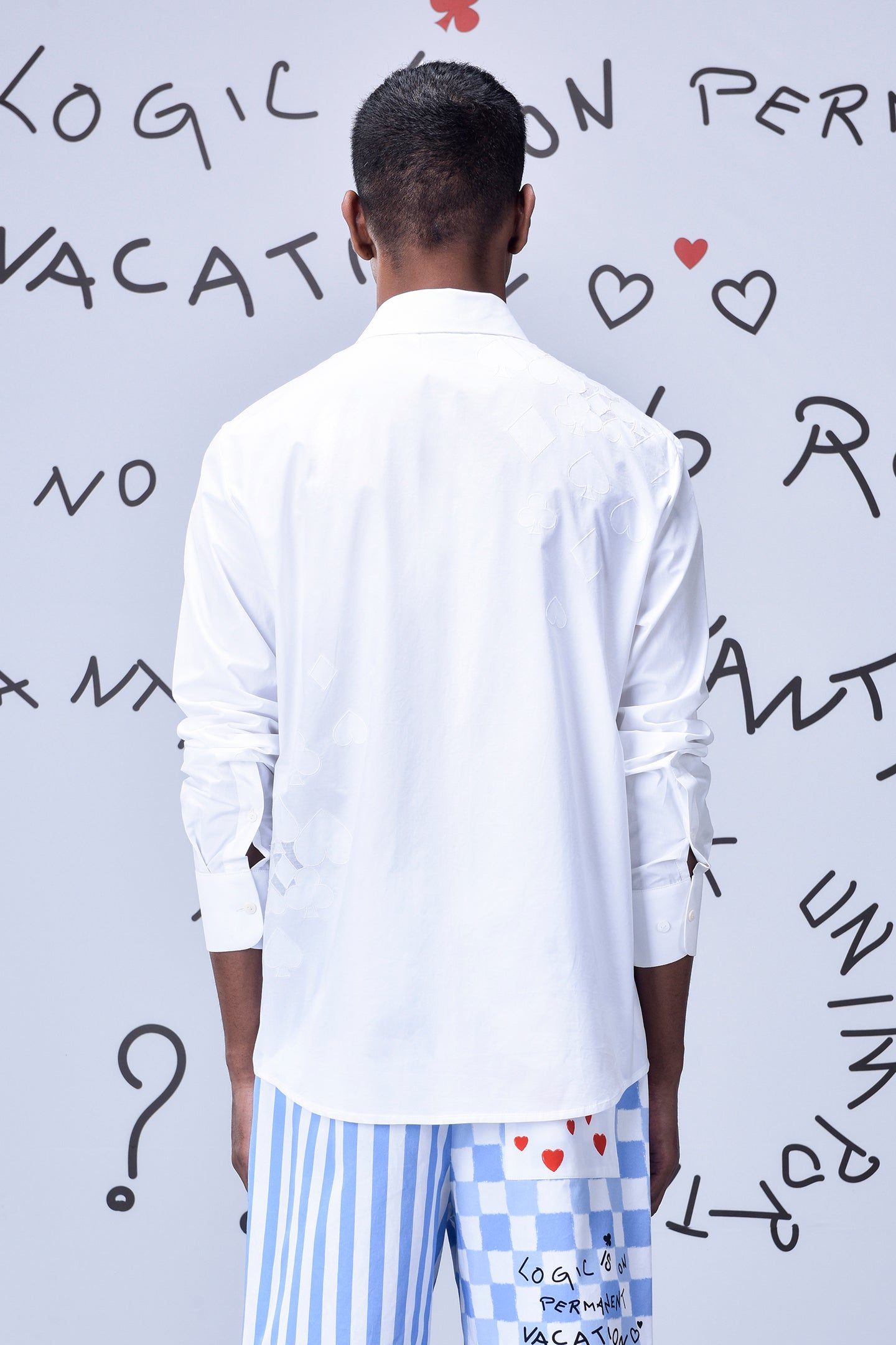 Back view of men's trendy white shirt by Stylera with long sleeves and clean design
