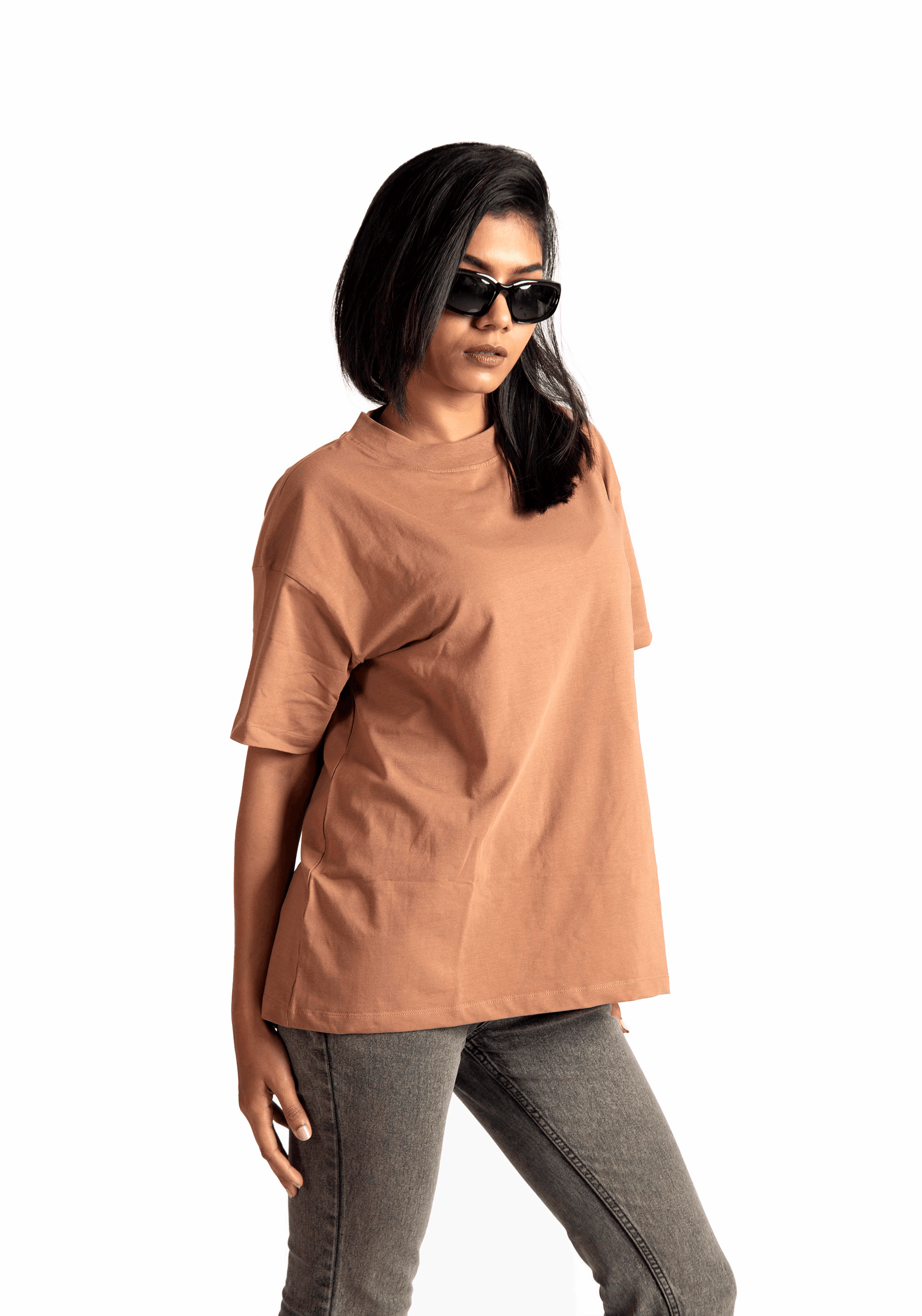 Stylera Mocha Brown oversized t-shirt worn by woman with sunglasses and gray jeans