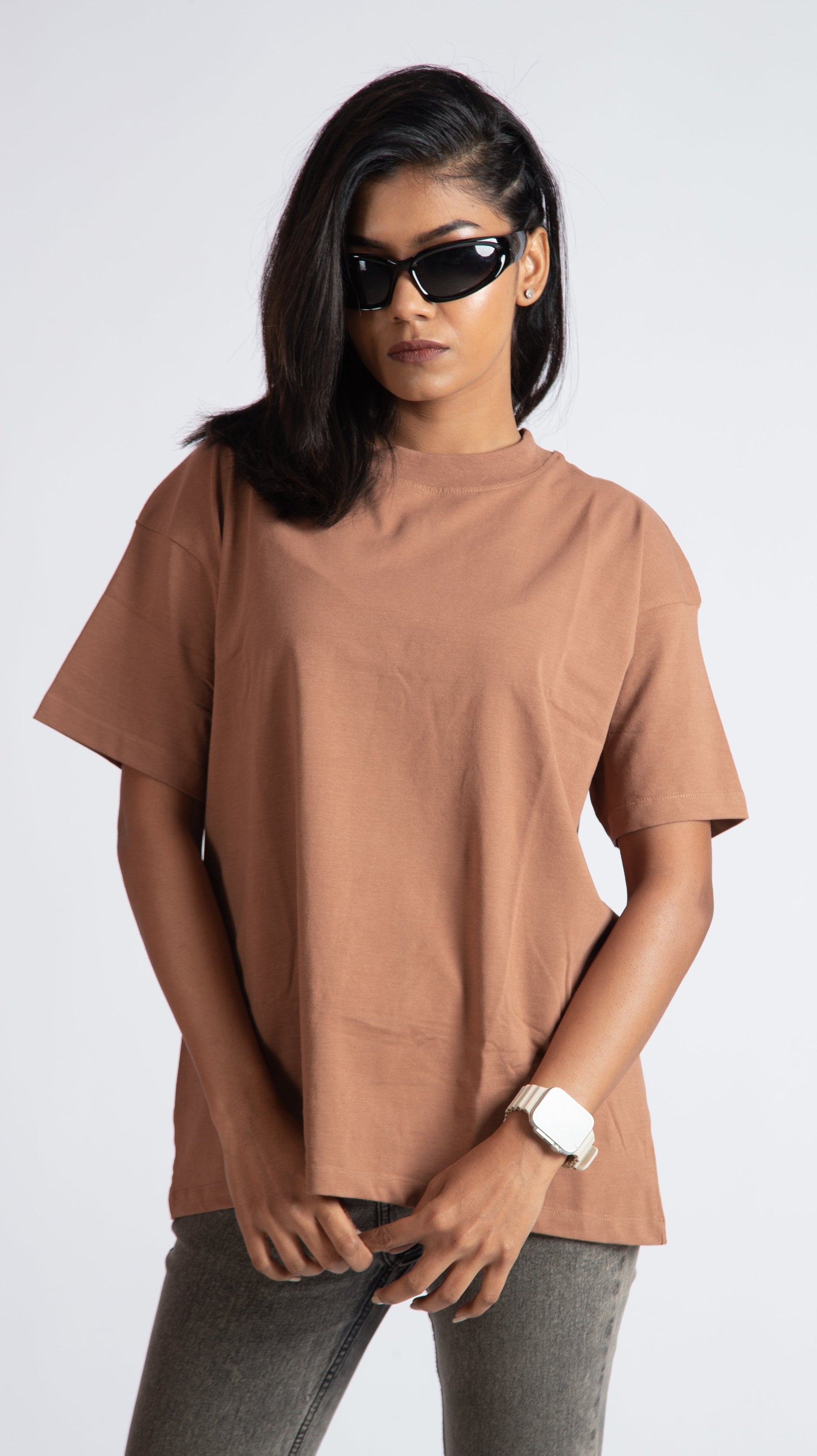 Stylera Mocha Brown oversized t-shirt worn by woman with black sunglasses