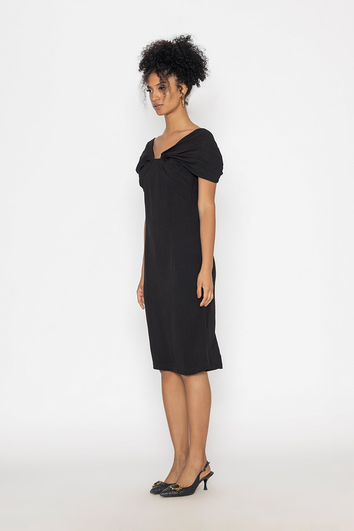 Stylera moonlit tide cocktail dress in black with short sleeves and knee-length hem