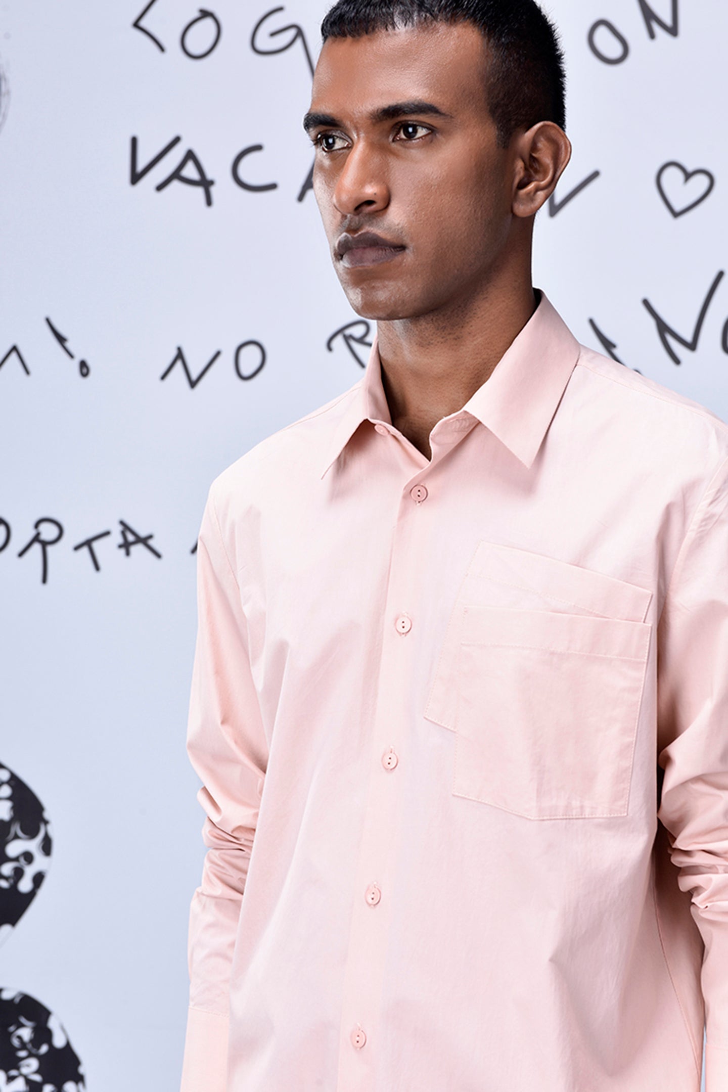 Stylera light pink overlapping pocket shirt with button-up front and long sleeves