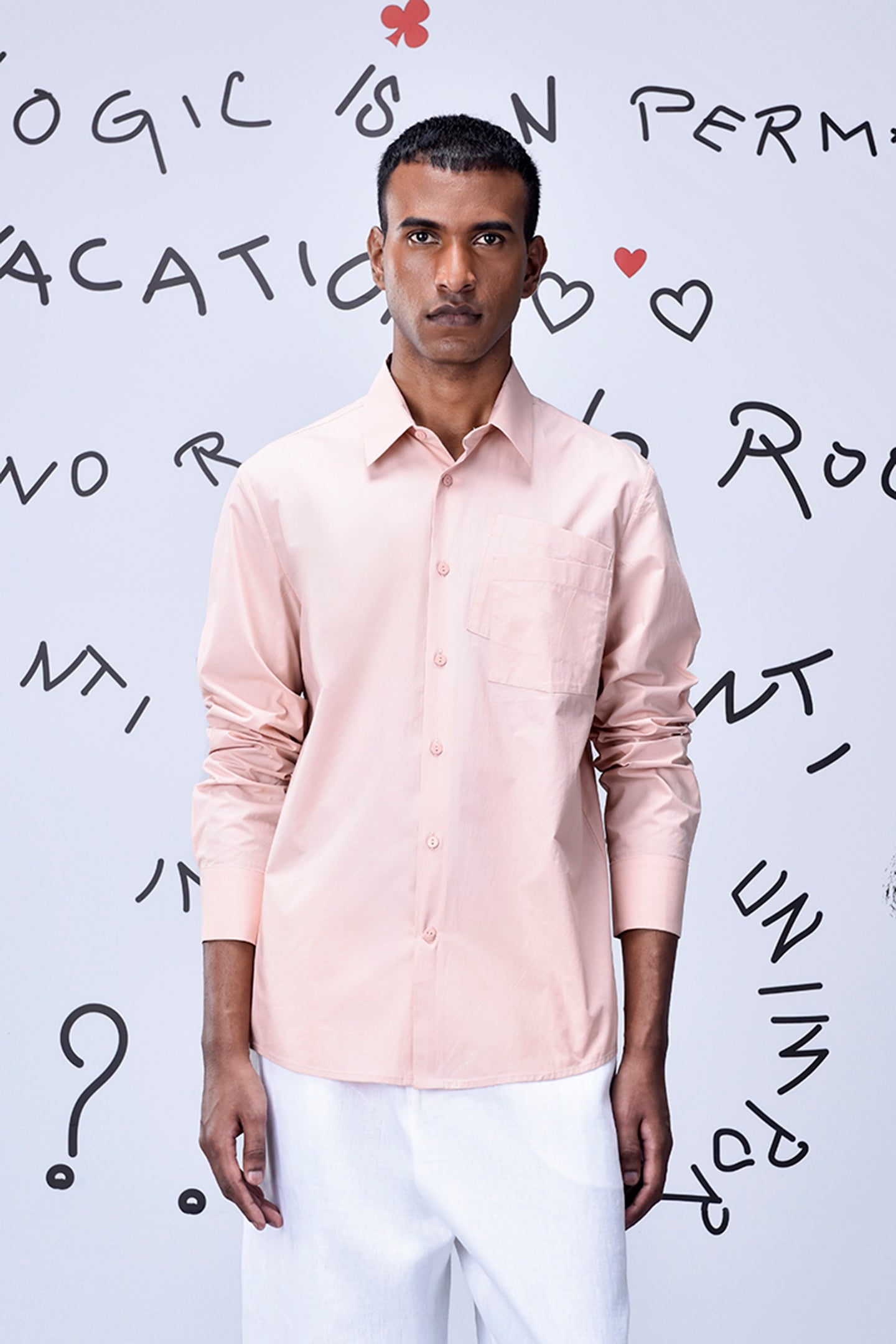 Stylera light pink overlapping pocket shirt worn by male model
