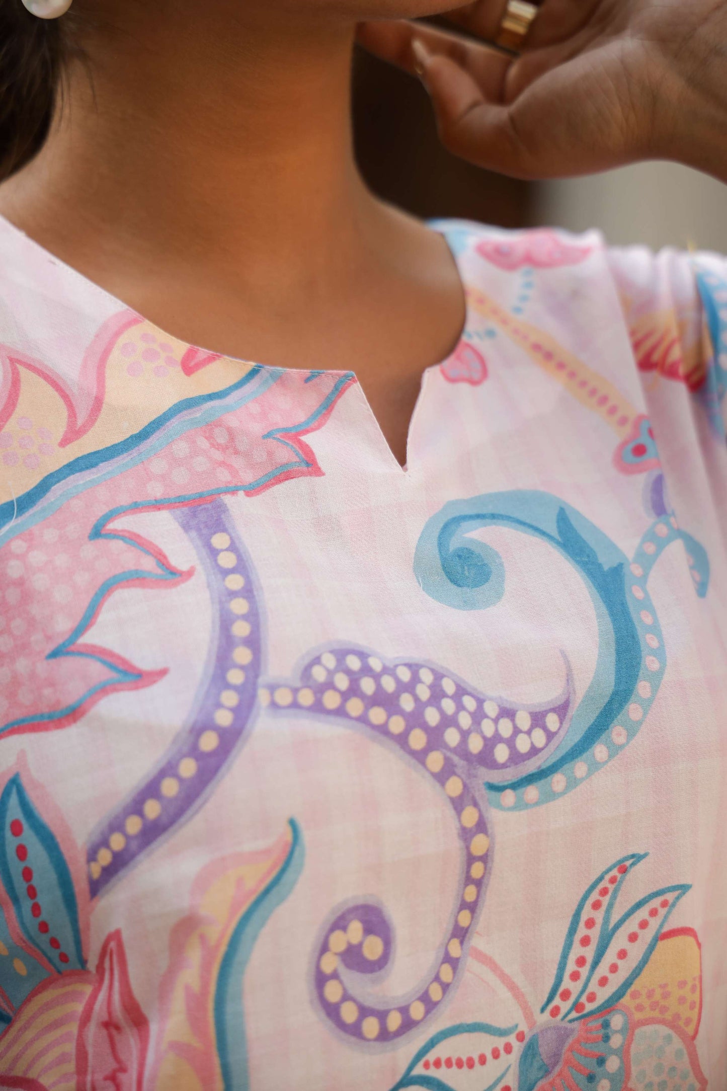 Close-up of pastel floral cotton co ord set design featuring vibrant colors and intricate patterns