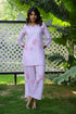 Stylish pastel pink cotton co-ord set featuring floral prints and comfortable fit for casual wear