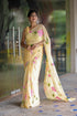 Pastel yellow floral saree for women with vibrant pink flowers and elegant draping style