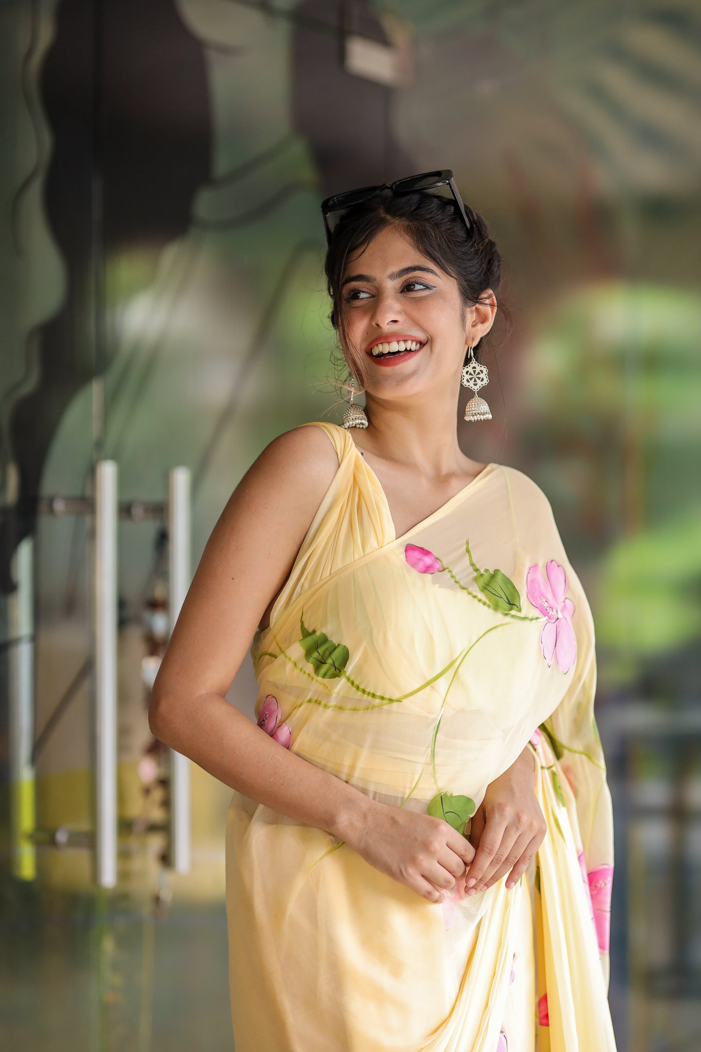 Pastel yellow floral saree for women with delicate embroidery, perfect for festive occasions