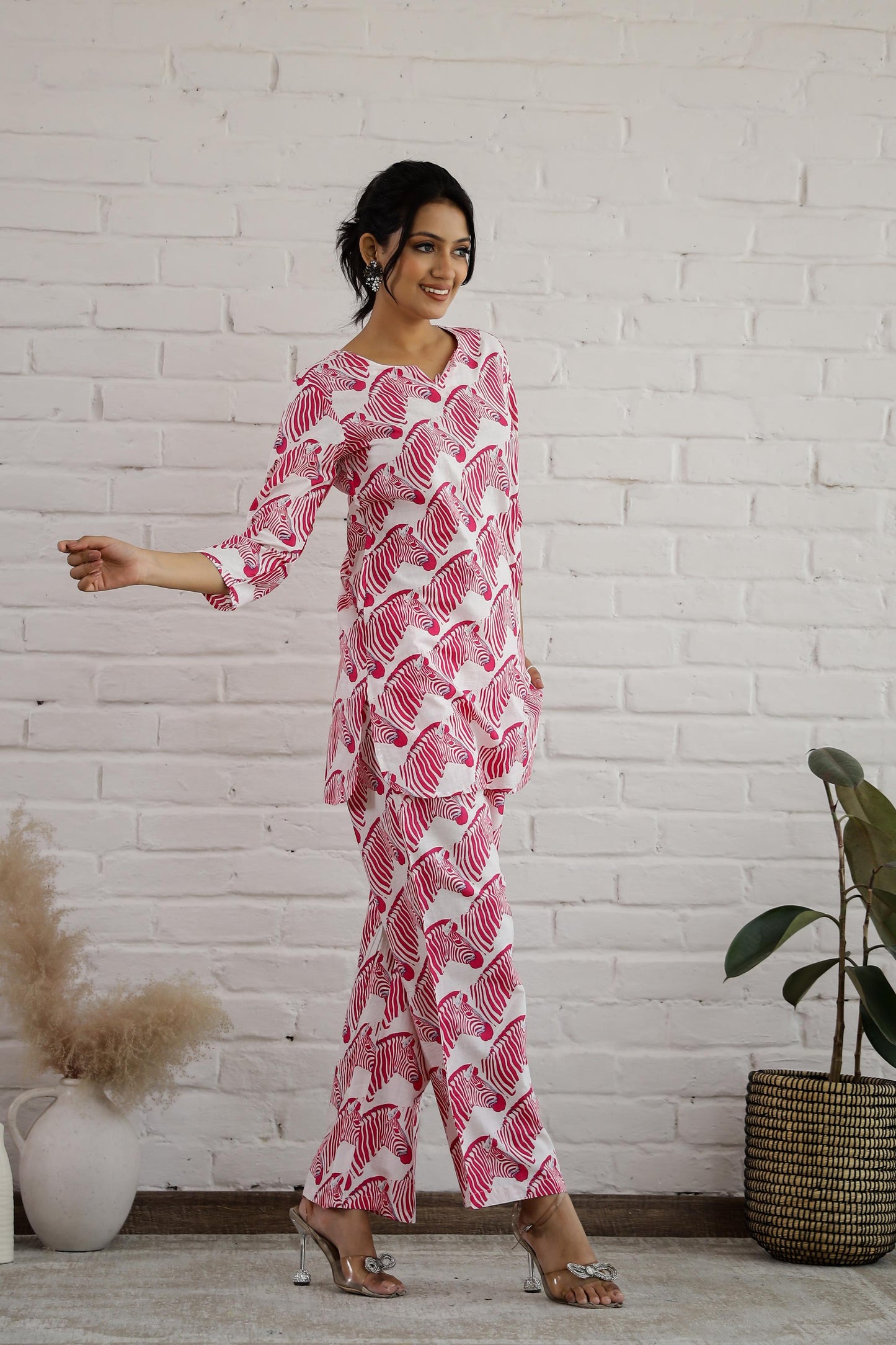 Stylish pink cotton matching set for women featuring a patterned top and comfortable pants