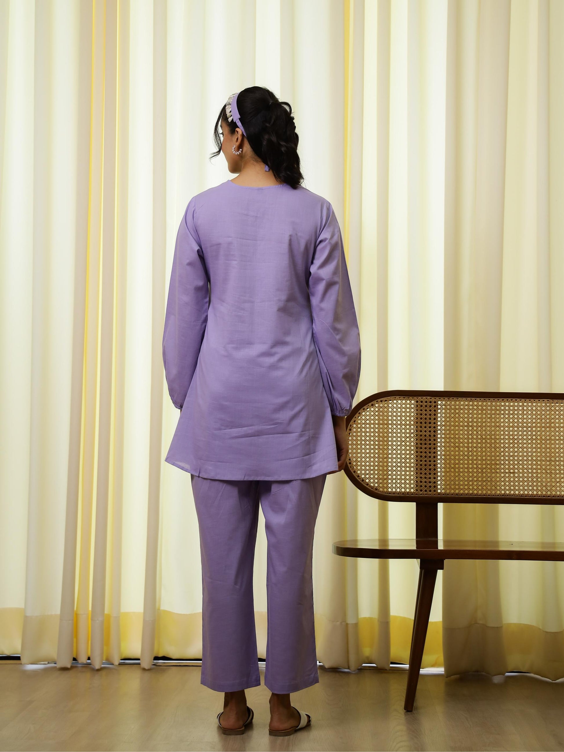 Back view of a stylish purple cotton co-ord set for women featuring a tunic and pants