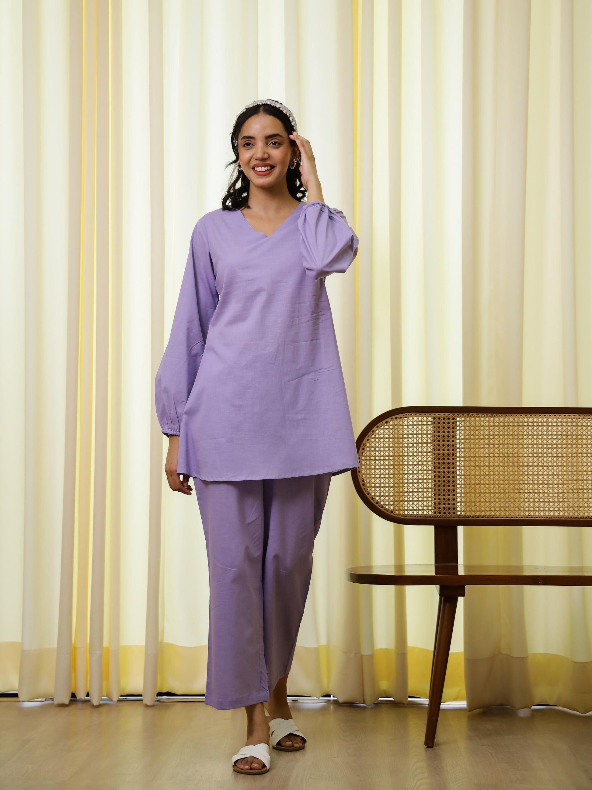 Stylish purple cotton co-ord set for women featuring a v-neck top and loose pants