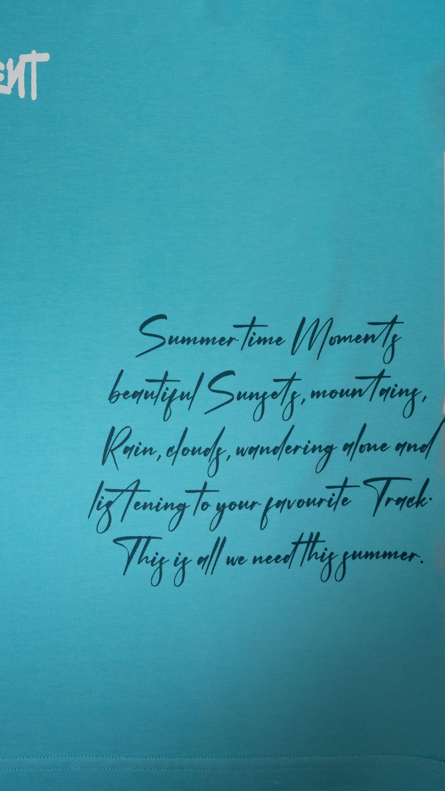 Stylstpls sky blue oversized t-shirt featuring a stylish summer quote in black text