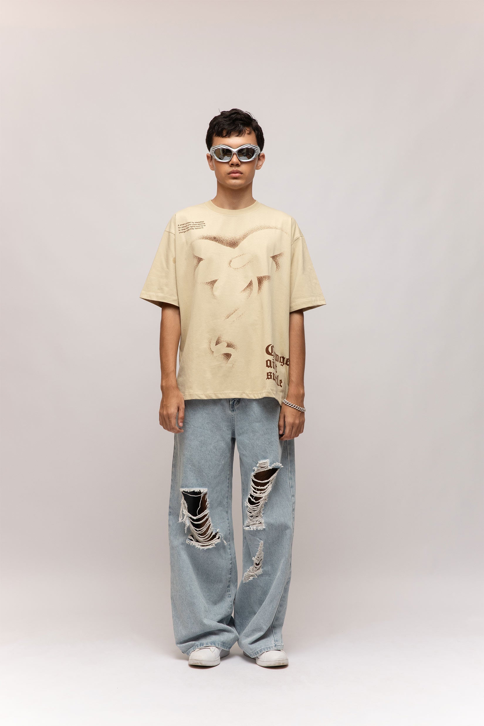 Stylera beige stencil art t-shirt oversized relaxed fit with abstract cutout design on model