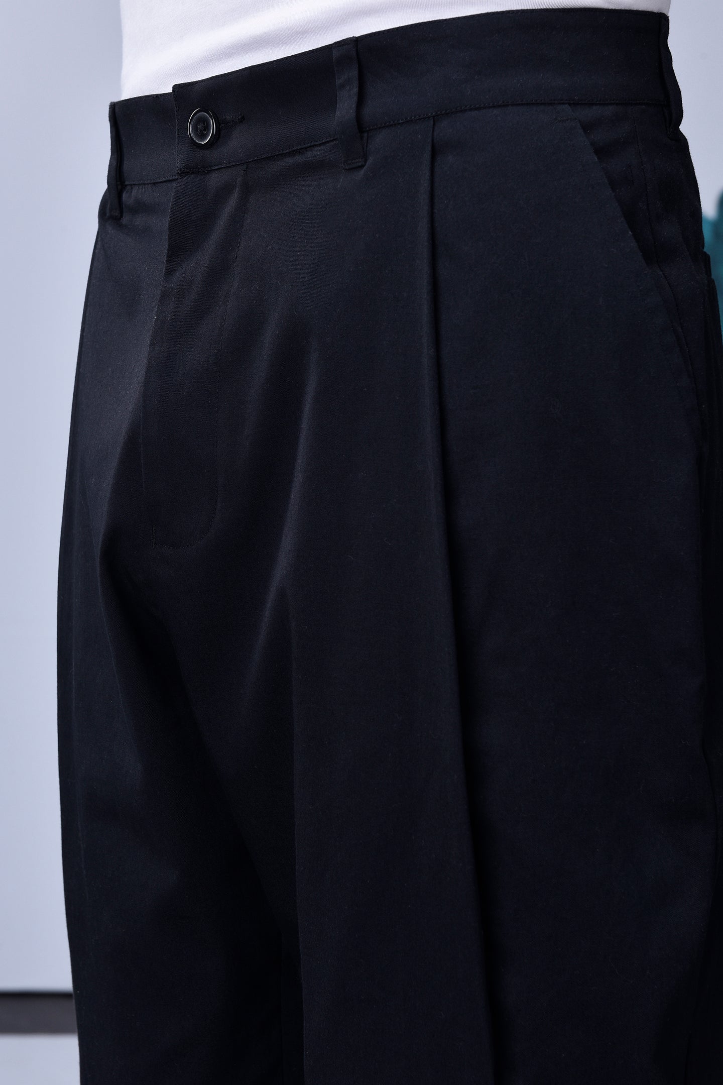 Stylish black pants for work by Stylera with front button and pockets