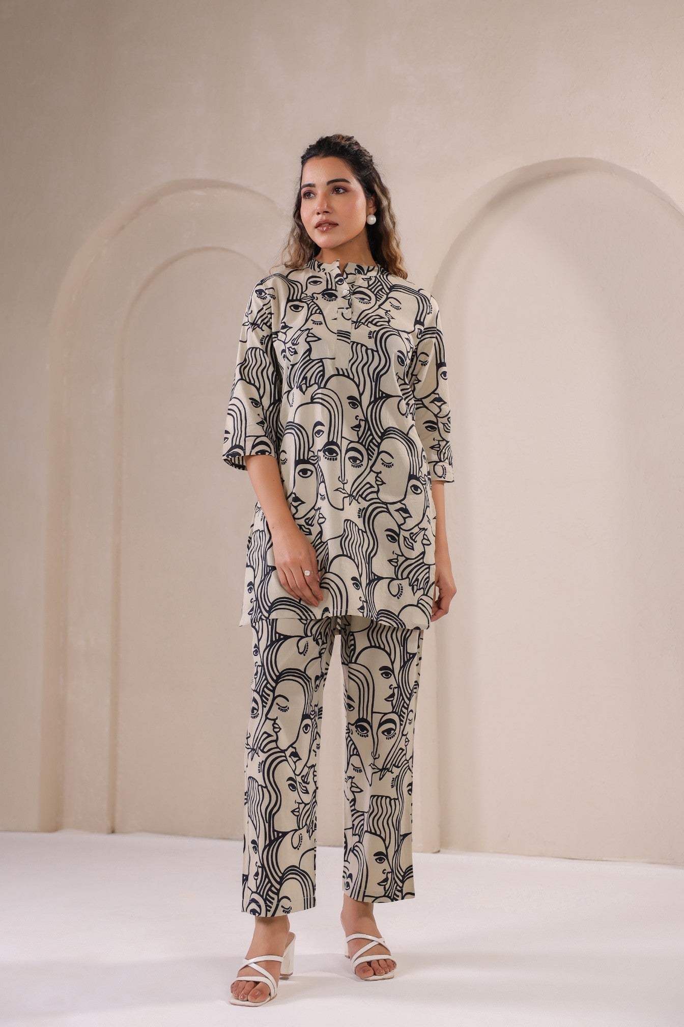 Stylish co-ord outfit for women featuring a face print tunic and matching pants from Stylera