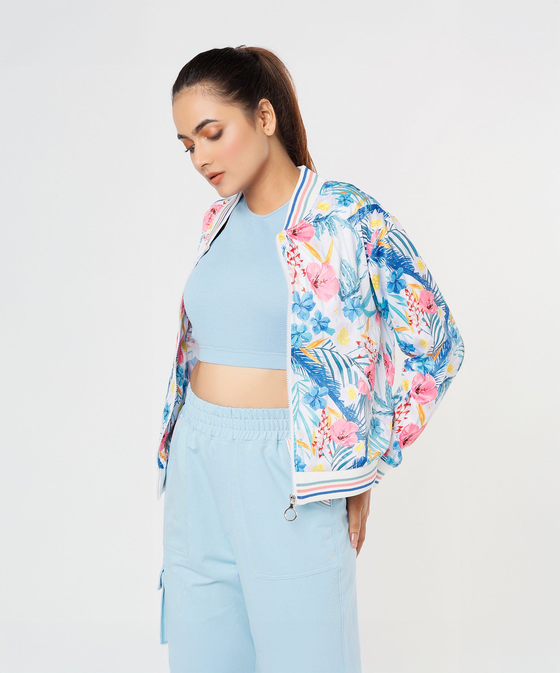 Fashionable stylish co ord sets for women featuring a floral bomber jacket and a blue crop top