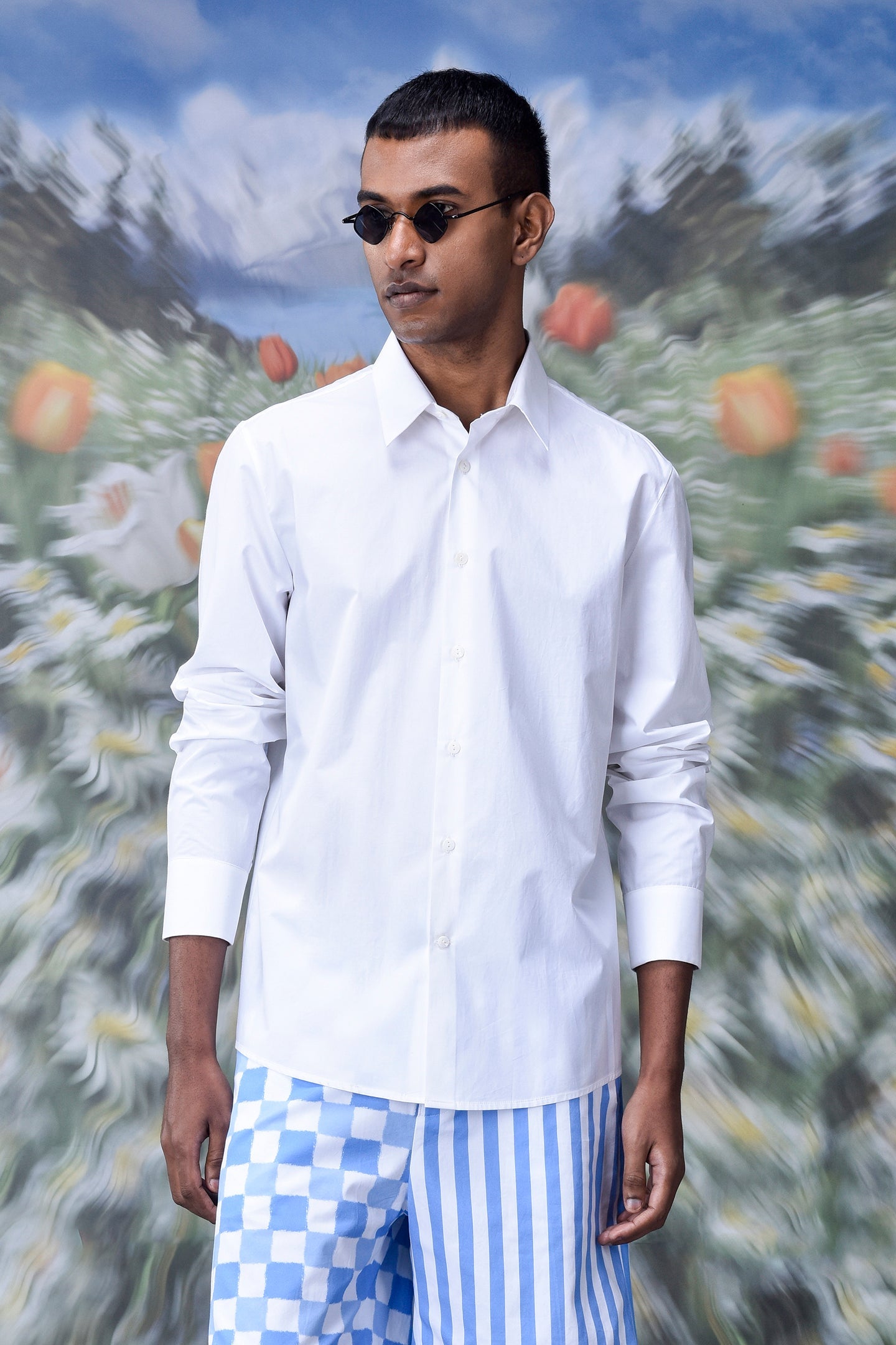 Stylera stylish white shirt for men worn with checkered and striped pants