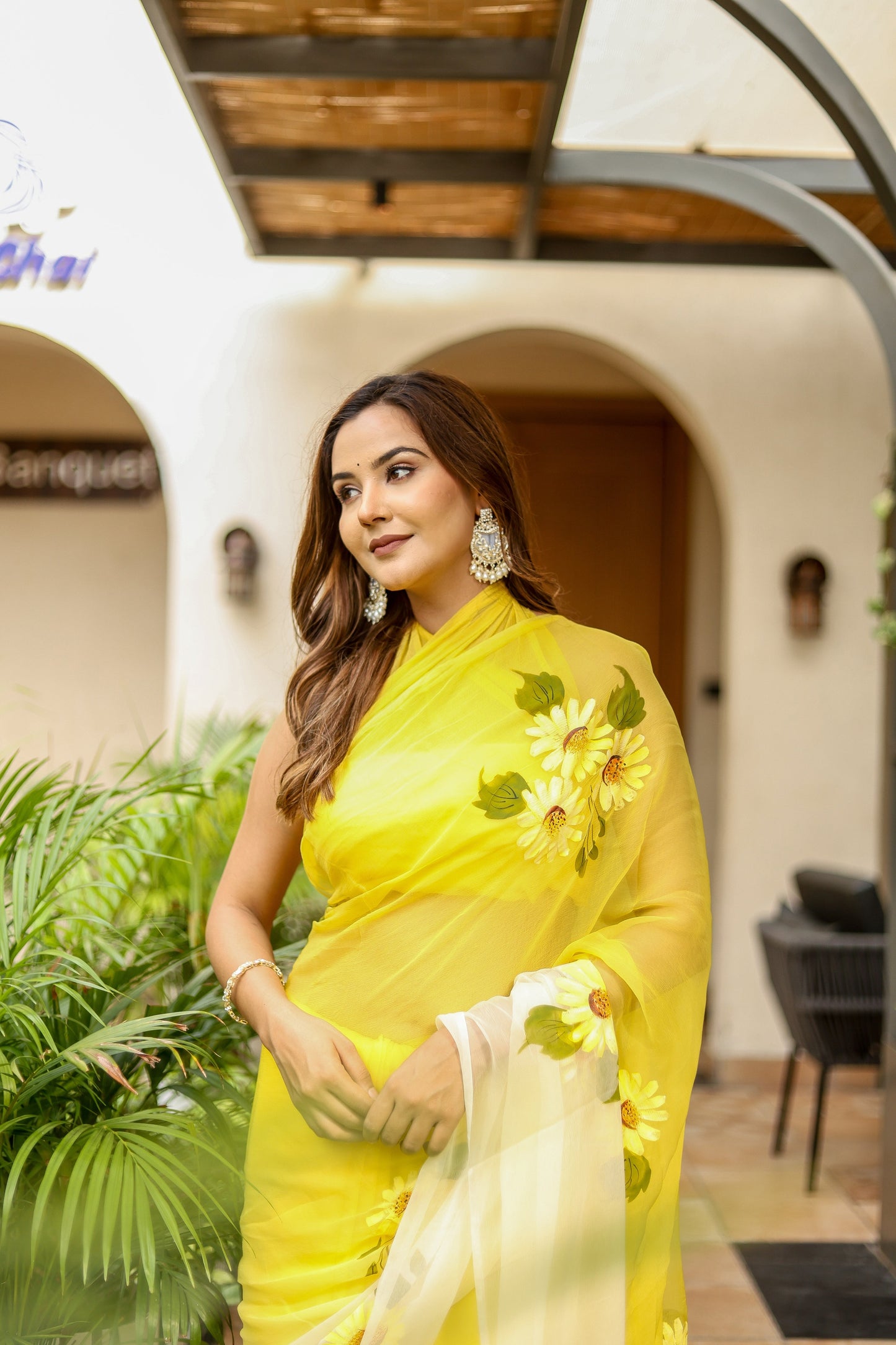 Elegant sunflower saree for women in yellow with floral embroidery, perfect for festive occasions