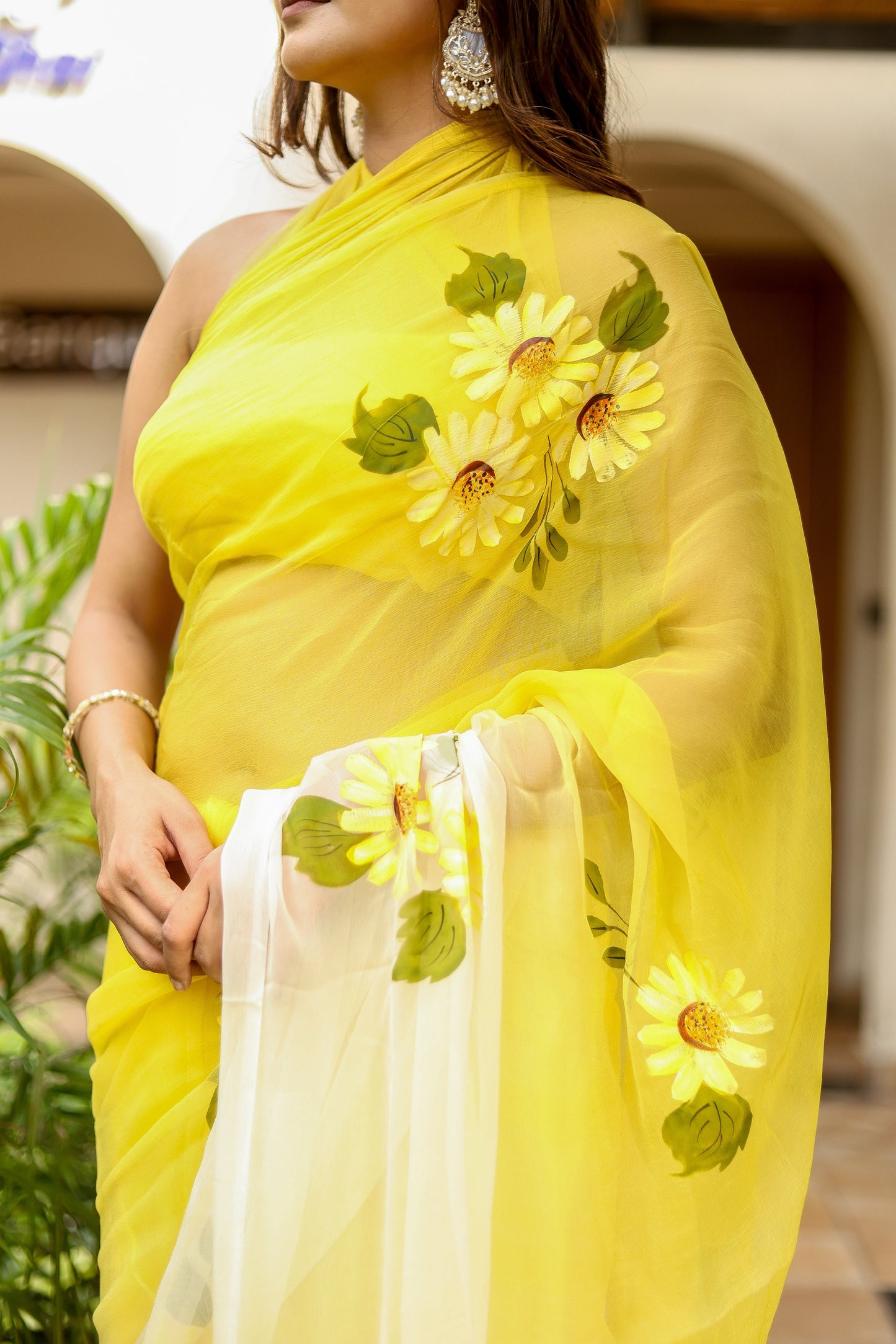 Elegant yellow sunflower saree for women with flower embroidery and a sheer drape
