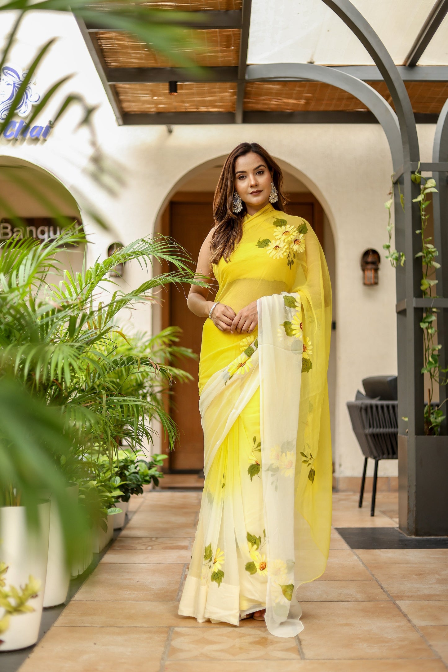 Elegant sunflower saree for women in yellow with floral embroidery for festive occasions