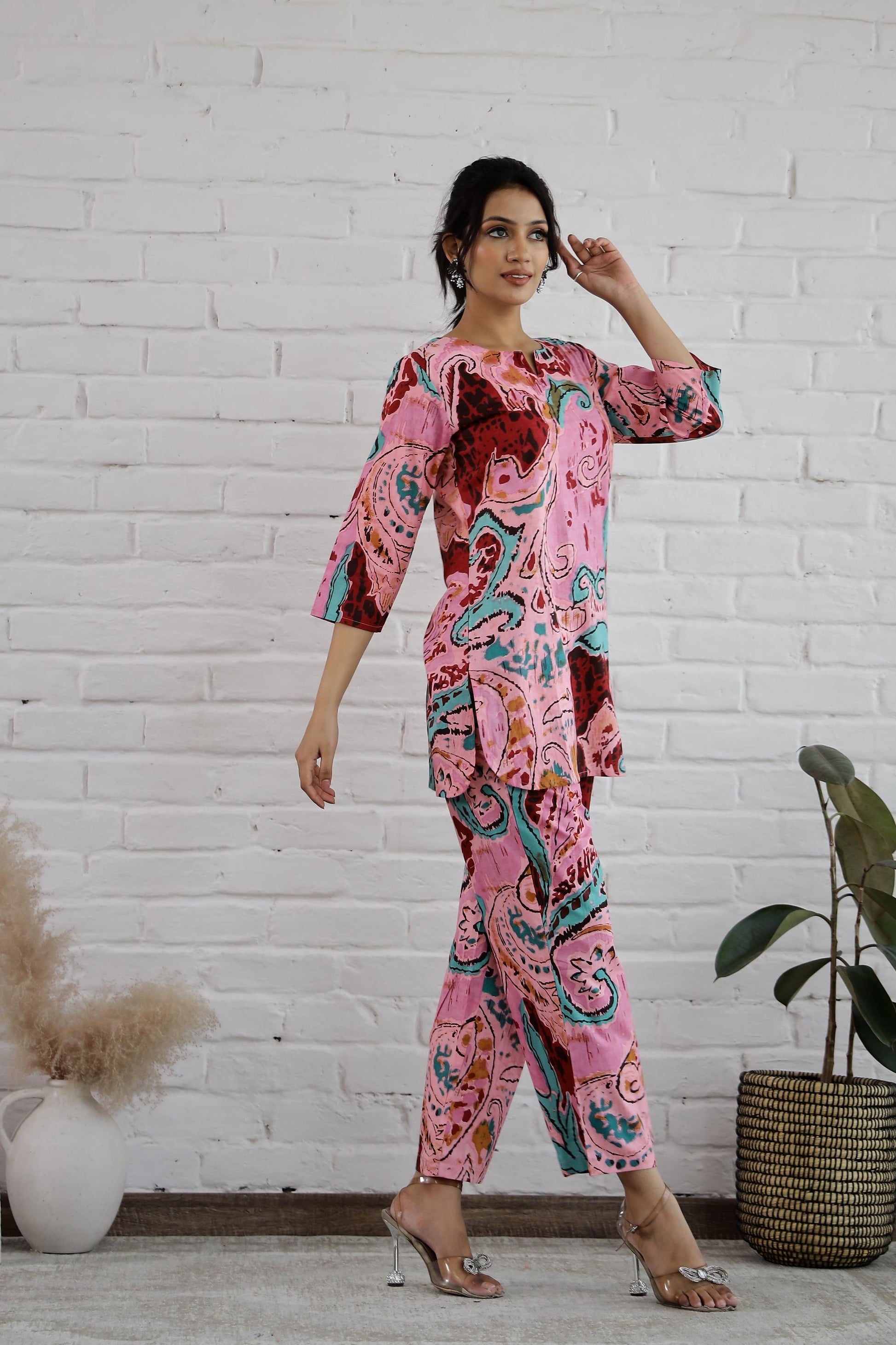 Trendy cotton two piece outfit featuring a colorful printed top and matching pants for stylish comfort