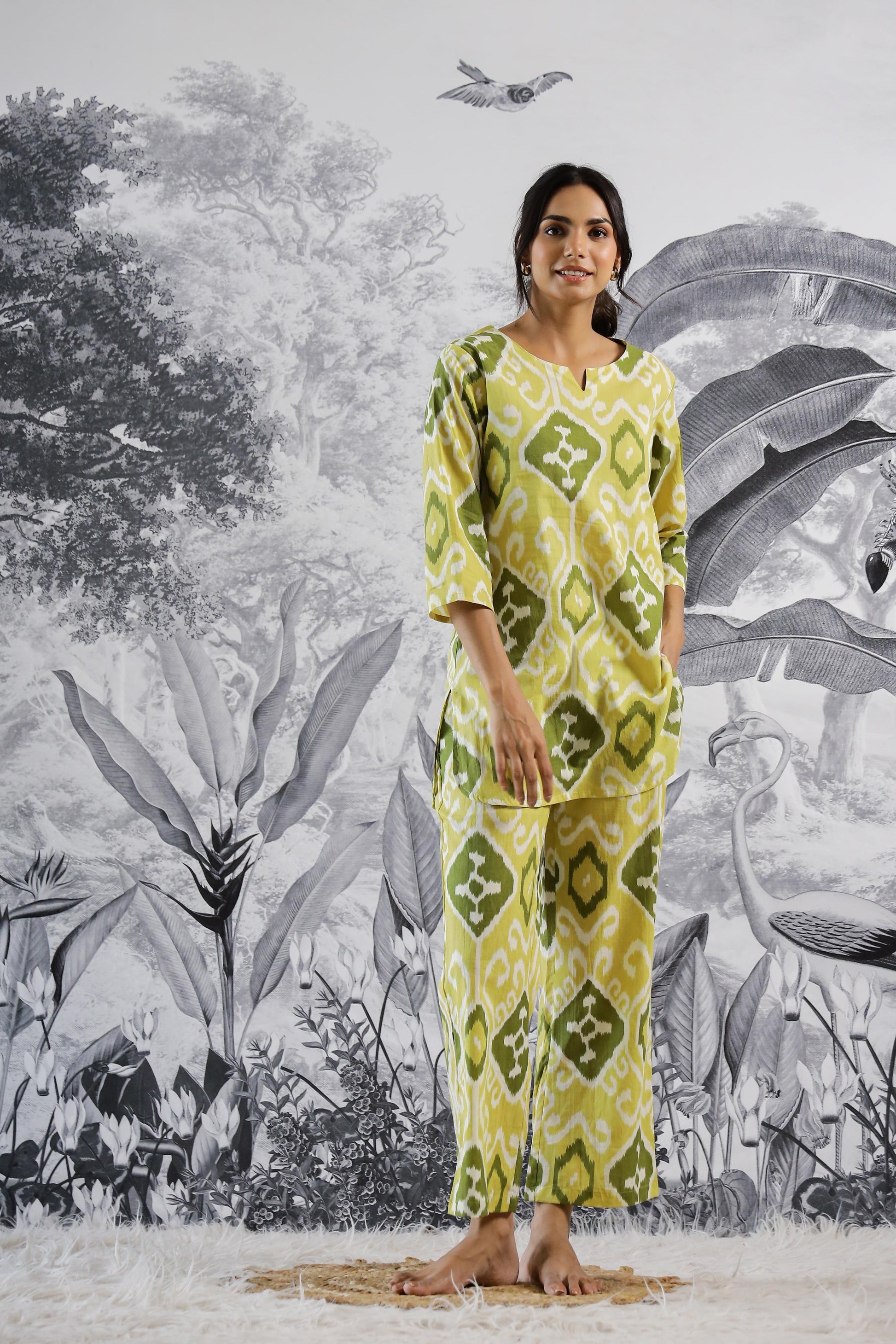 Stylera trendy cotton two piece outfit in green and yellow geometric print, perfect for casual wear