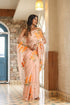 Trendy peach saree with floral design featuring elegant embroidery and lightweight fabric