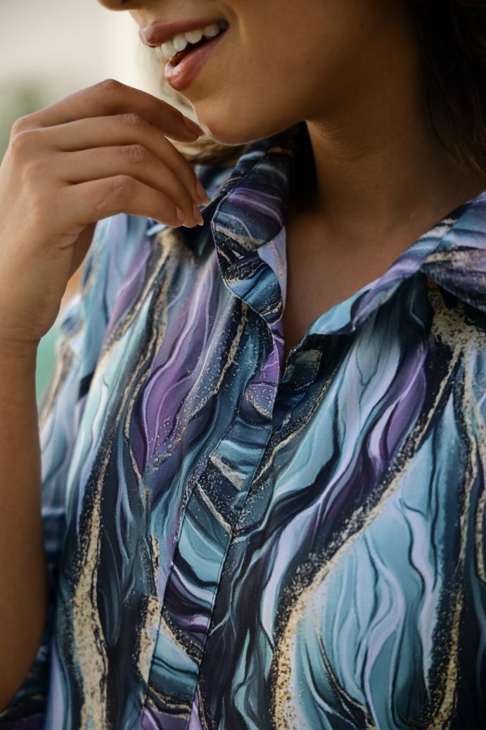 Trendy satin pajamas set with a stylish purple and blue wave pattern, perfect for lounging or sleepwear