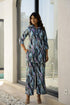 Stylera trendy satin pajamas set in a colorful wave pattern, ideal for stylish lounging