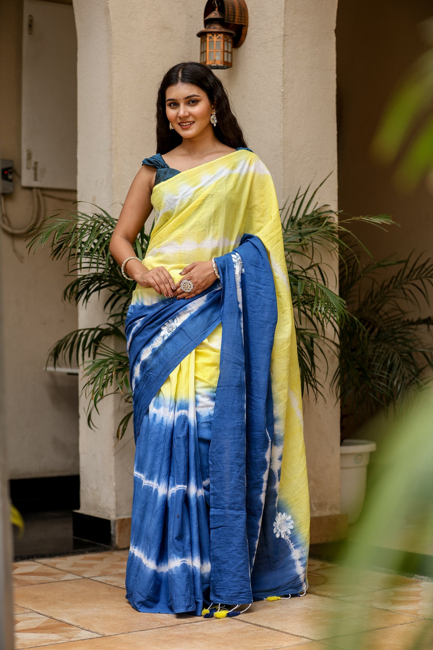 Unique designer saree for women in blue and yellow with stylish tie-dye patterns