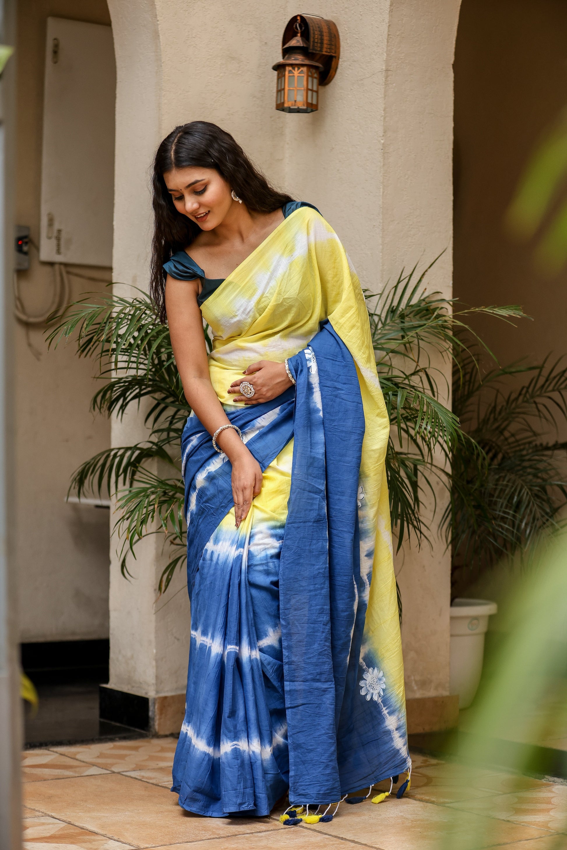 Elegant unique designer saree for women in blue and yellow with a vibrant tie-dye pattern
