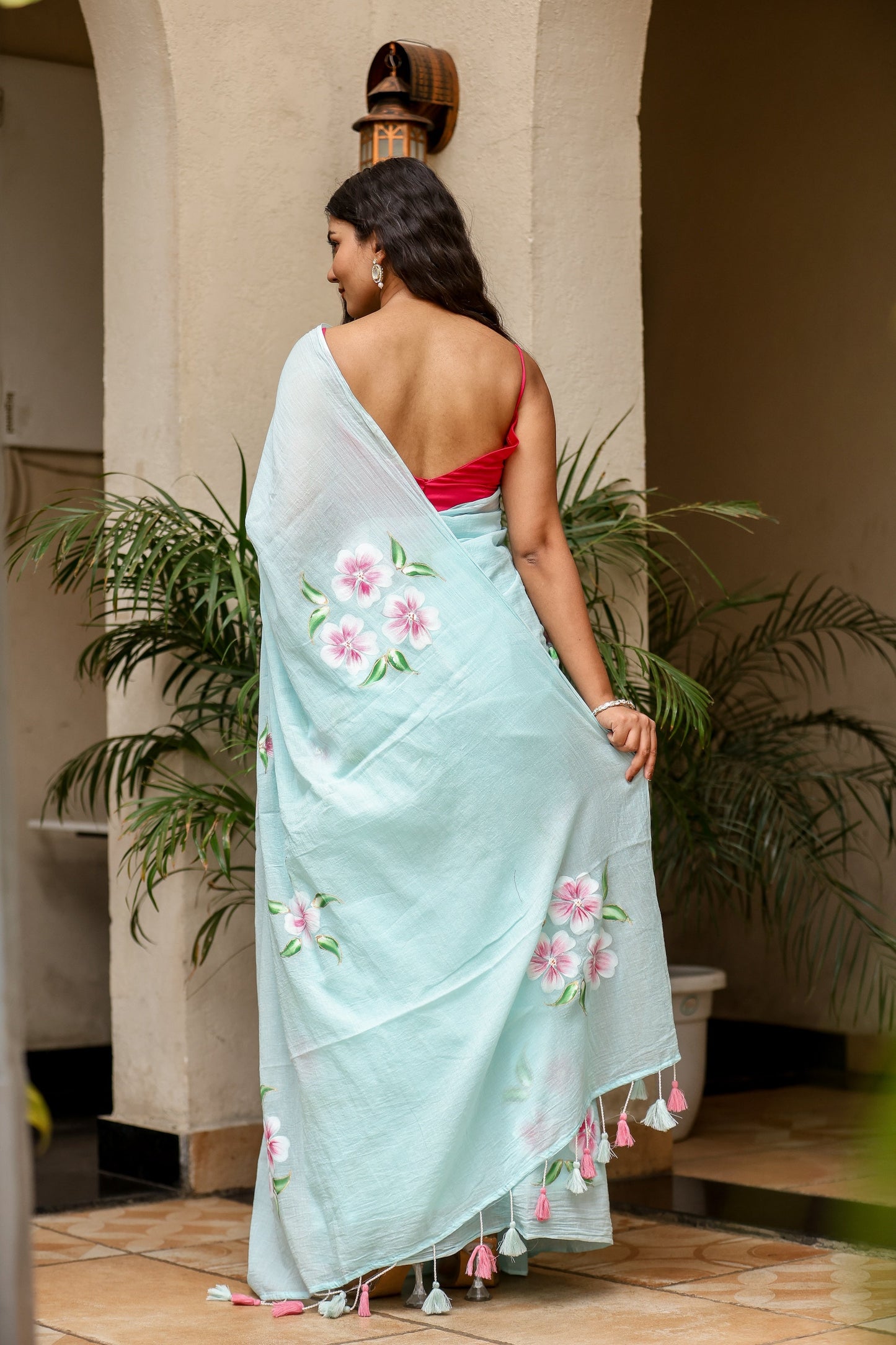 Elegant Stylera unique designer sarees for parties with floral embroidery and tassels