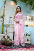 Elegant unique handpainted saree for weddings designed with floral patterns in soft pink shade