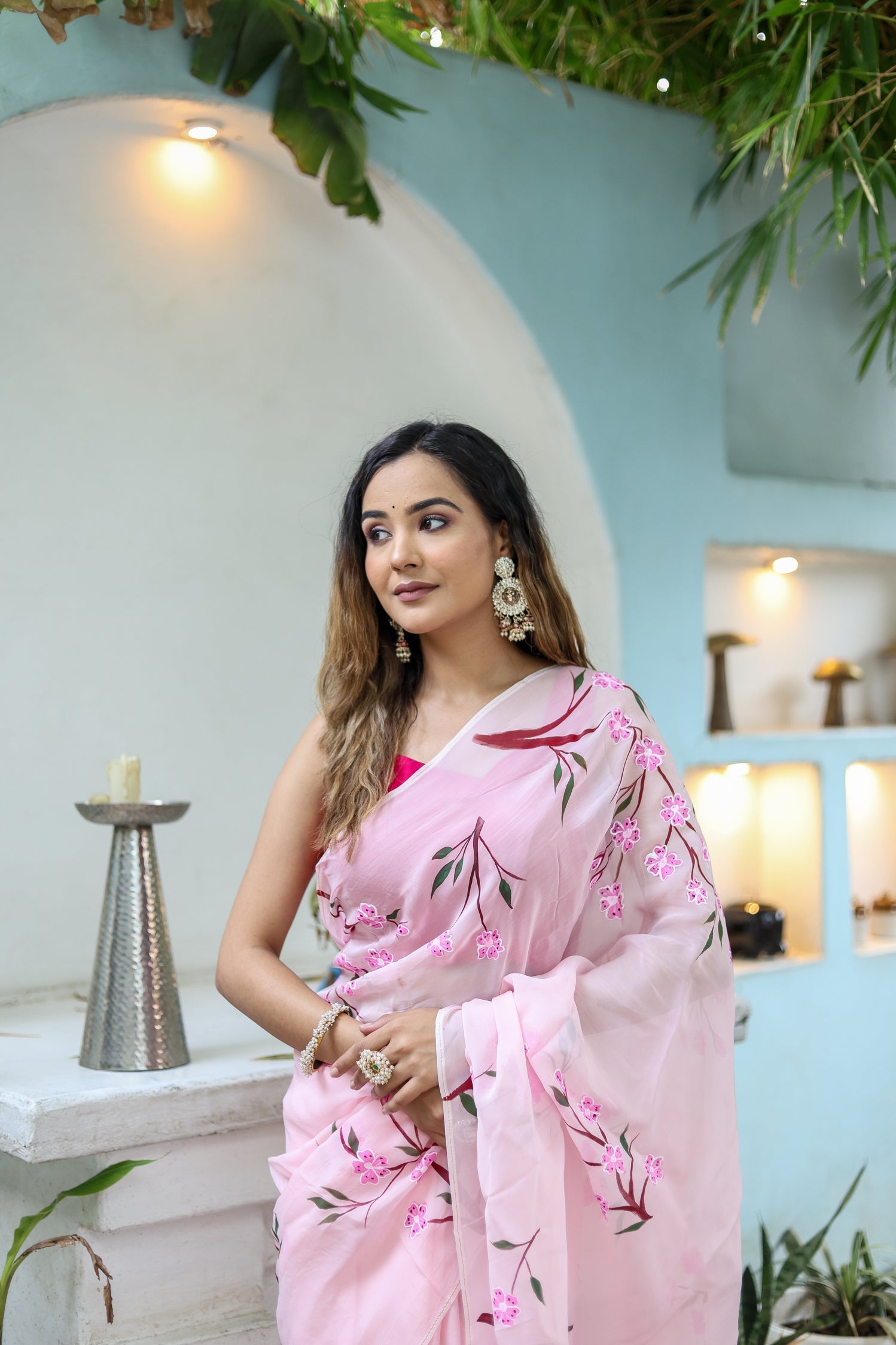 Stylera unique handpainted saree for weddings in soft pink with floral design