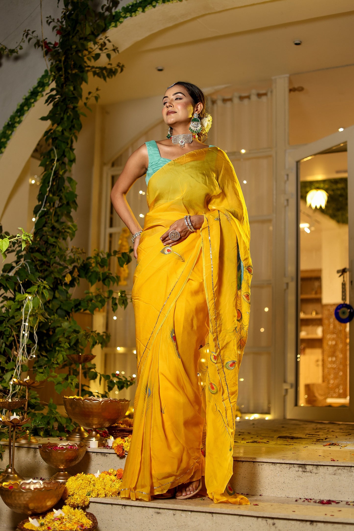 Unique Indian saree with embroidery in vibrant yellow, styled elegantly for festive occasions