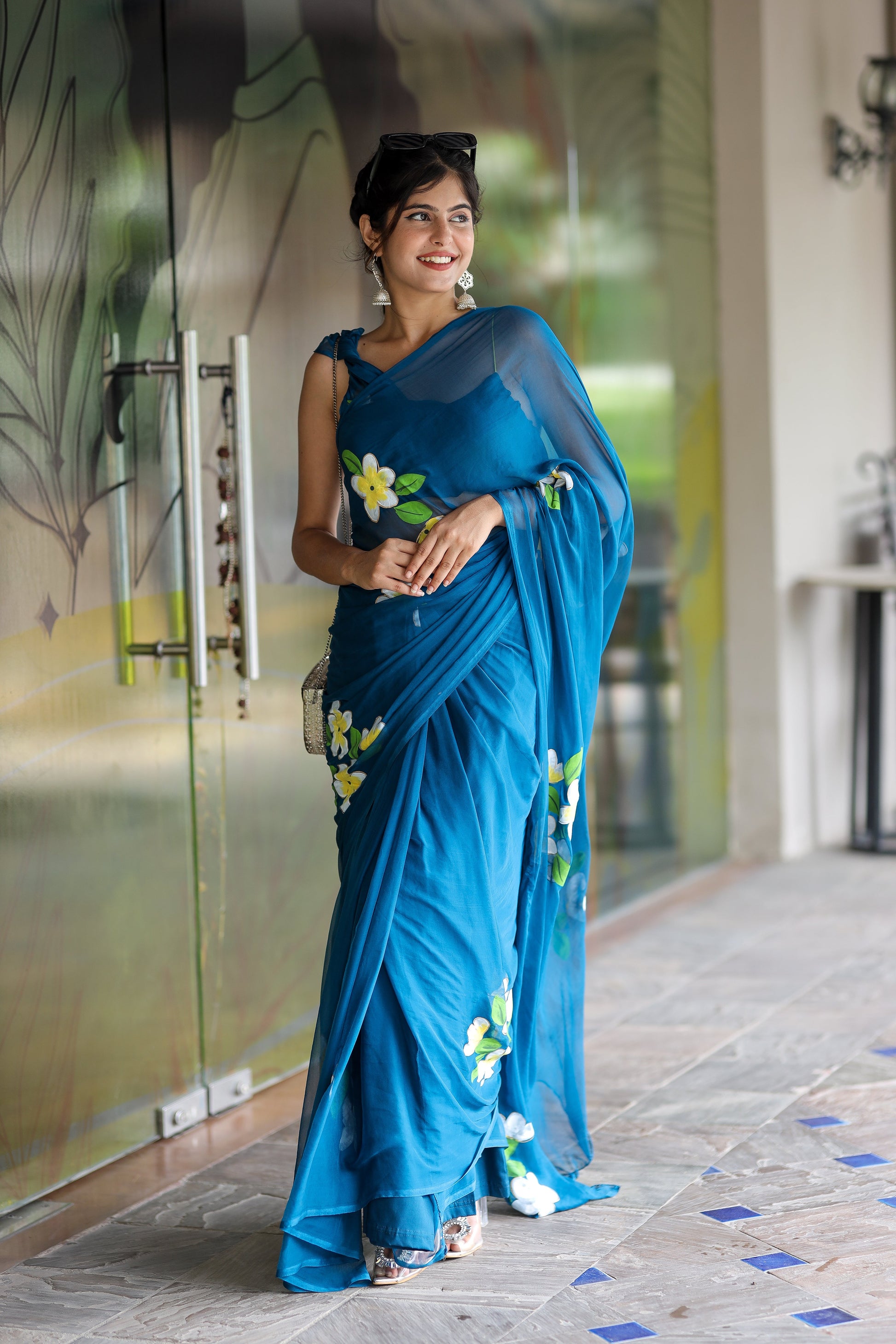 Stylera unique party wear saree in blue with floral embroidery for elegant occasions